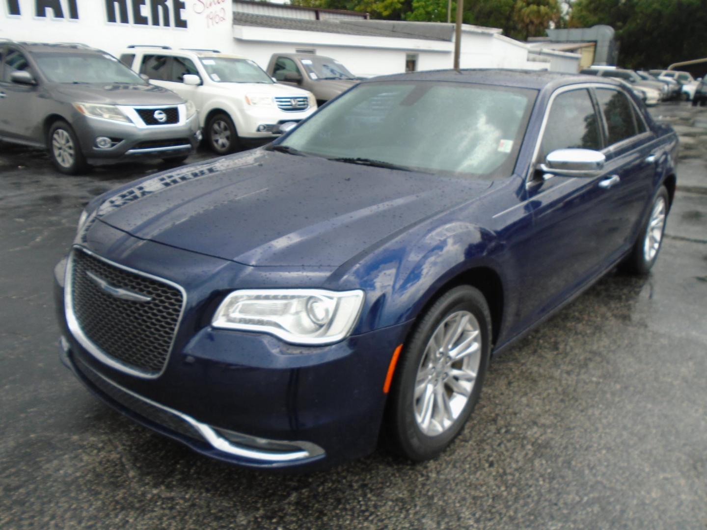 2015 Blue /White Chrysler 300 C RWD (2C3CCAEG1FH) with an 3.6L V6 SOHC 24V engine, 8A transmission, located at 6112 N Florida Avenue, Tampa, FL, 33604, (888) 521-5131, 27.954929, -82.459534 - 499$ down plus tax & tag. - Photo#1