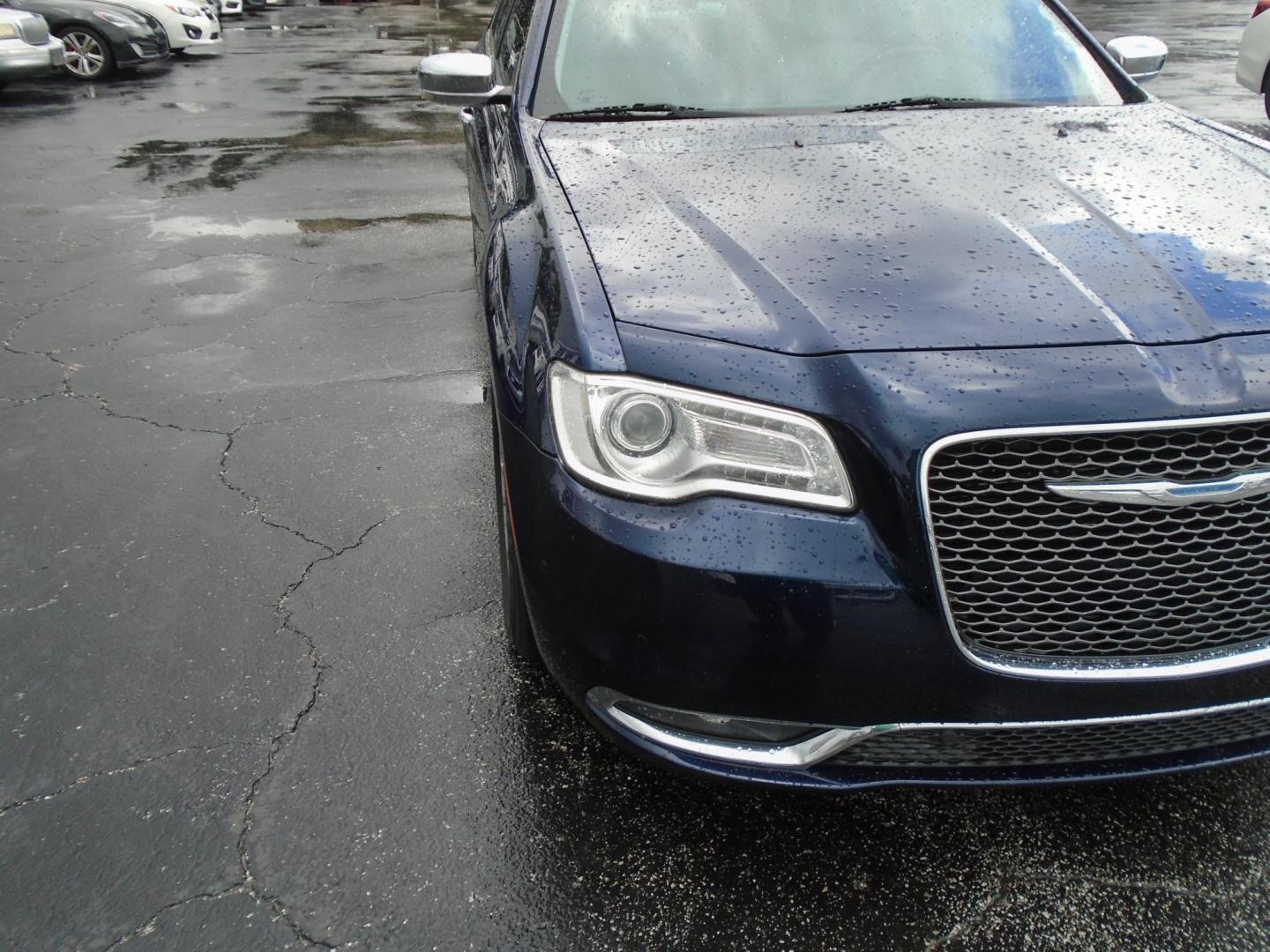 2015 Blue /White Chrysler 300 C RWD (2C3CCAEG1FH) with an 3.6L V6 SOHC 24V engine, 8A transmission, located at 6112 N Florida Avenue, Tampa, FL, 33604, (888) 521-5131, 27.954929, -82.459534 - 499$ down plus tax & tag. - Photo#4