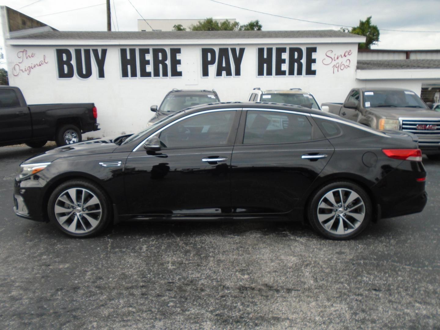 2019 BLACK /BLACK Kia Optima LX (5XXGT4L35KG) with an 2.4L L4 DOHC 16V engine, 6A transmission, located at 6112 N Florida Avenue, Tampa, FL, 33604, (888) 521-5131, 27.954929, -82.459534 - 499$ DOWN PLUS TAX & TAG. - Photo#0