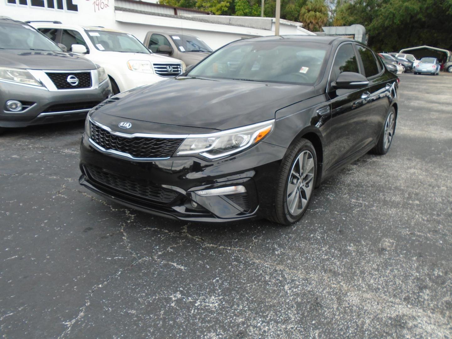 2019 BLACK /BLACK Kia Optima LX (5XXGT4L35KG) with an 2.4L L4 DOHC 16V engine, 6A transmission, located at 6112 N Florida Avenue, Tampa, FL, 33604, (888) 521-5131, 27.954929, -82.459534 - 499$ DOWN PLUS TAX & TAG. - Photo#2