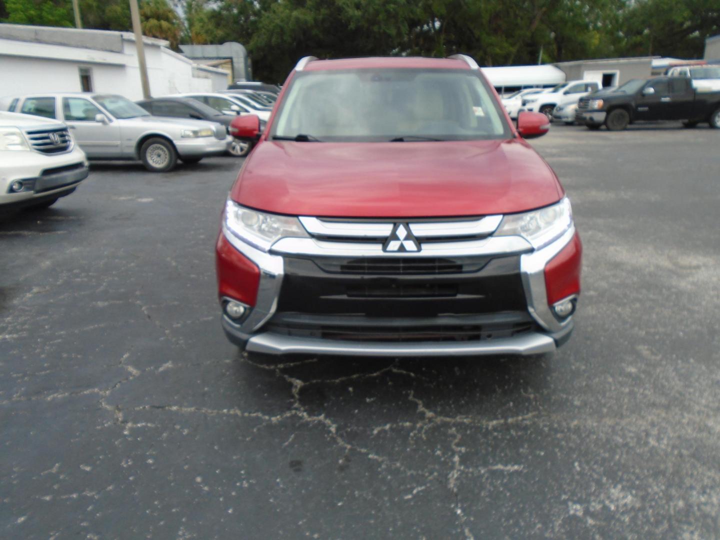 2017 RED /Beige Mitsubishi Outlander SEL 2WD (JA4AD3A3XHZ) with an 2.4L L4 DOHC 16V engine, CVT transmission, located at 6112 N Florida Avenue, Tampa, FL, 33604, (888) 521-5131, 27.954929, -82.459534 - 499$ DOWN PLUS TAX & TAG. - Photo#1