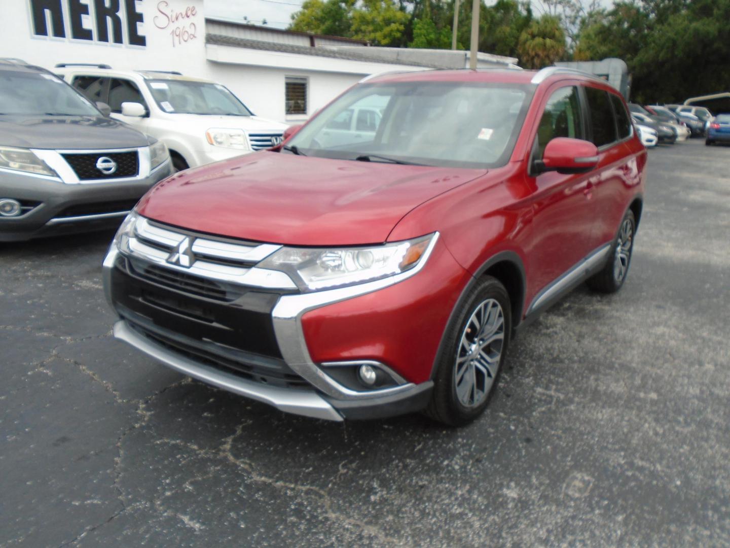 2017 RED /Beige Mitsubishi Outlander SEL 2WD (JA4AD3A3XHZ) with an 2.4L L4 DOHC 16V engine, CVT transmission, located at 6112 N Florida Avenue, Tampa, FL, 33604, (888) 521-5131, 27.954929, -82.459534 - 499$ DOWN PLUS TAX & TAG. - Photo#2