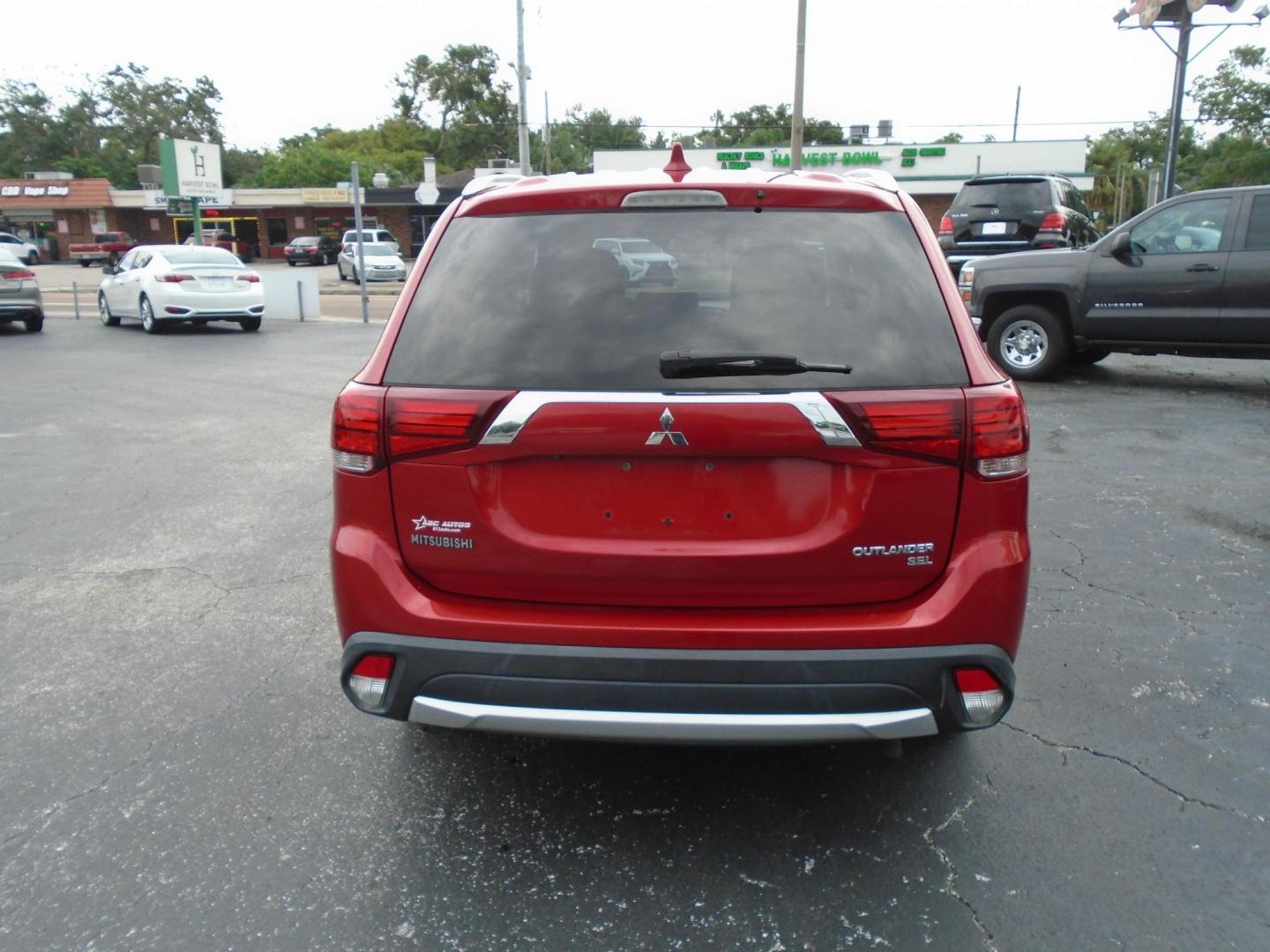 2017 RED /Beige Mitsubishi Outlander SEL 2WD (JA4AD3A3XHZ) with an 2.4L L4 DOHC 16V engine, CVT transmission, located at 6112 N Florida Avenue, Tampa, FL, 33604, (888) 521-5131, 27.954929, -82.459534 - 499$ DOWN PLUS TAX & TAG. - Photo#4