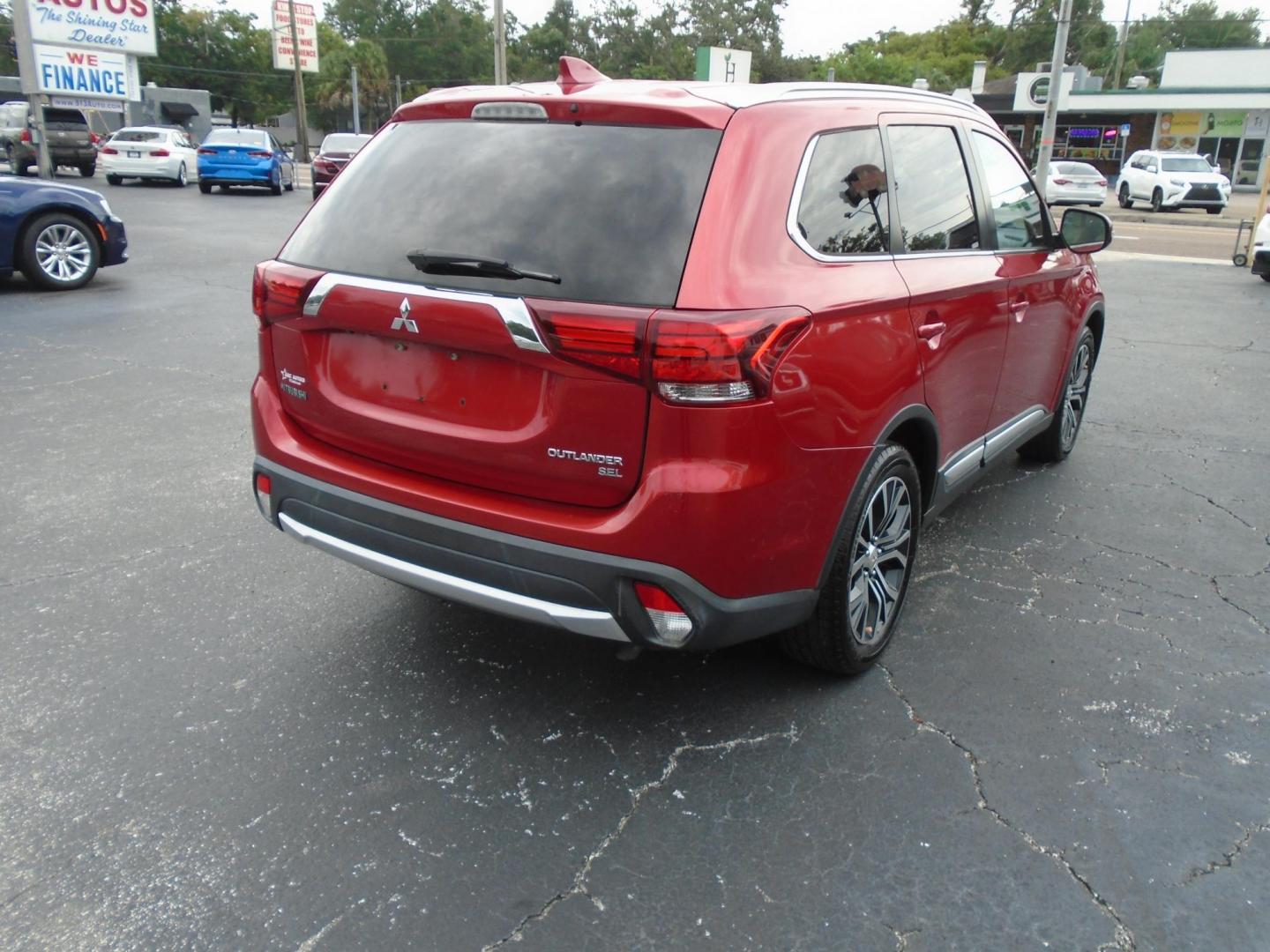 2017 RED /Beige Mitsubishi Outlander SEL 2WD (JA4AD3A3XHZ) with an 2.4L L4 DOHC 16V engine, CVT transmission, located at 6112 N Florida Avenue, Tampa, FL, 33604, (888) 521-5131, 27.954929, -82.459534 - 499$ DOWN PLUS TAX & TAG. - Photo#5
