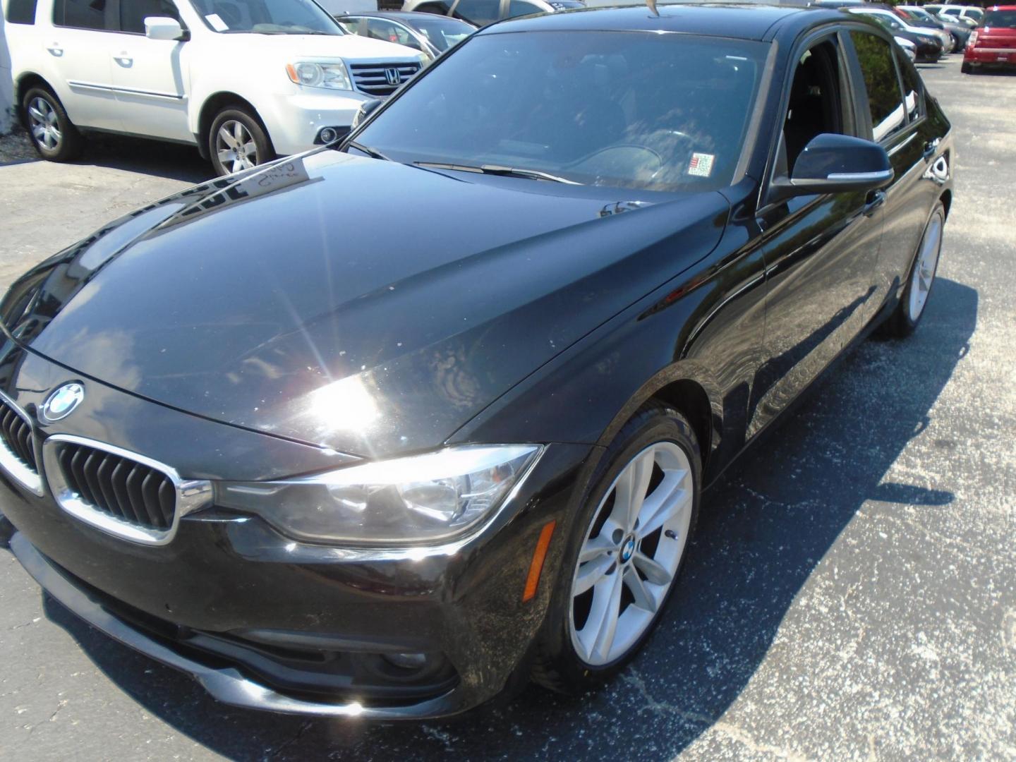 2016 BLACK /Black BMW 3-Series 320i Sedan (WBA8E1G54GN) with an 2.0L L4 DOHC 16V engine, 8A transmission, located at 6112 N Florida Avenue, Tampa, FL, 33604, (888) 521-5131, 27.954929, -82.459534 - 499$ down plus tax & tag. - Photo#1