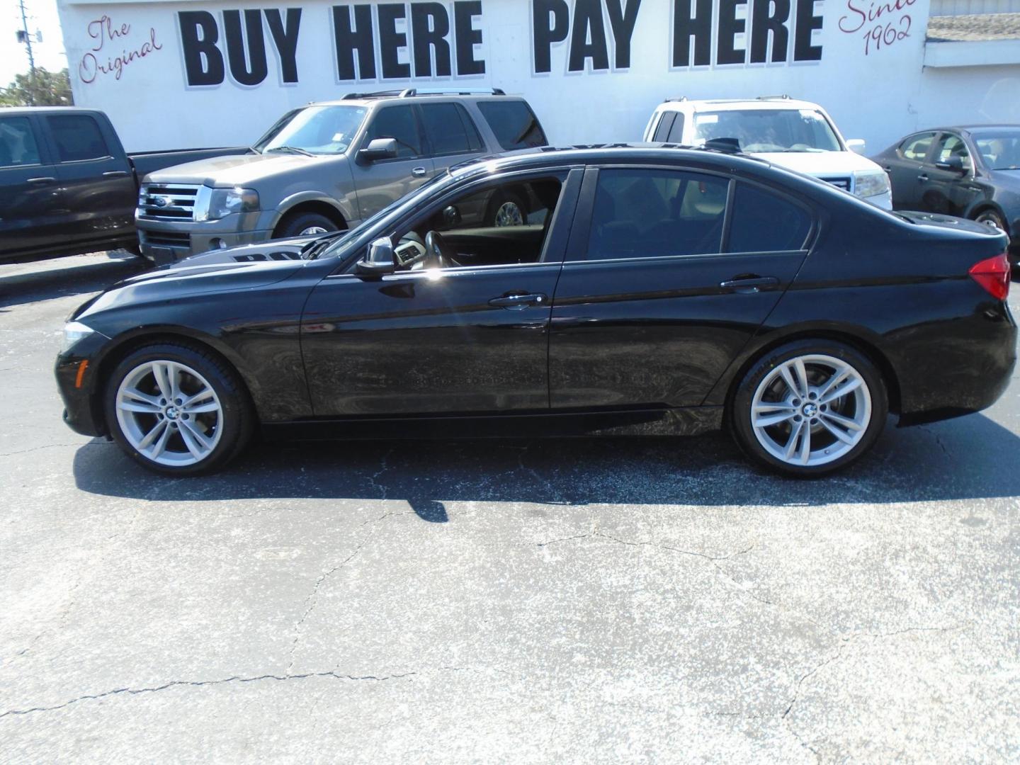 2016 BLACK /Black BMW 3-Series 320i Sedan (WBA8E1G54GN) with an 2.0L L4 DOHC 16V engine, 8A transmission, located at 6112 N Florida Avenue, Tampa, FL, 33604, (888) 521-5131, 27.954929, -82.459534 - 499$ down plus tax & tag. - Photo#0
