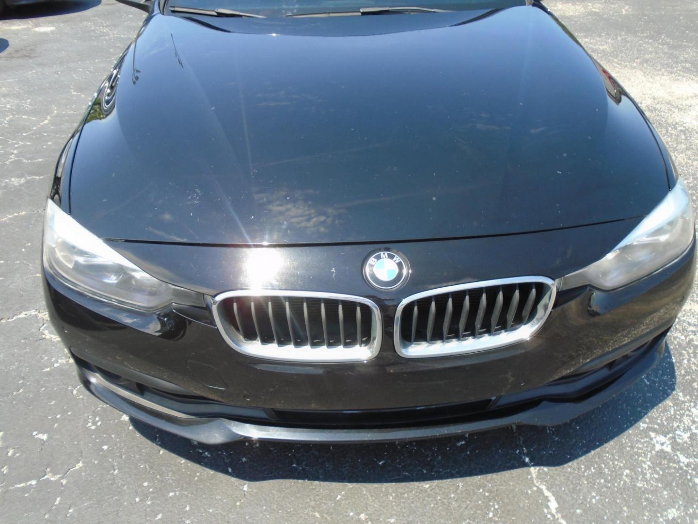 2016 BLACK /Black BMW 3-Series 320i Sedan (WBA8E1G54GN) with an 2.0L L4 DOHC 16V engine, 8A transmission, located at 6112 N Florida Avenue, Tampa, FL, 33604, (888) 521-5131, 27.954929, -82.459534 - 499$ down plus tax & tag. - Photo#2