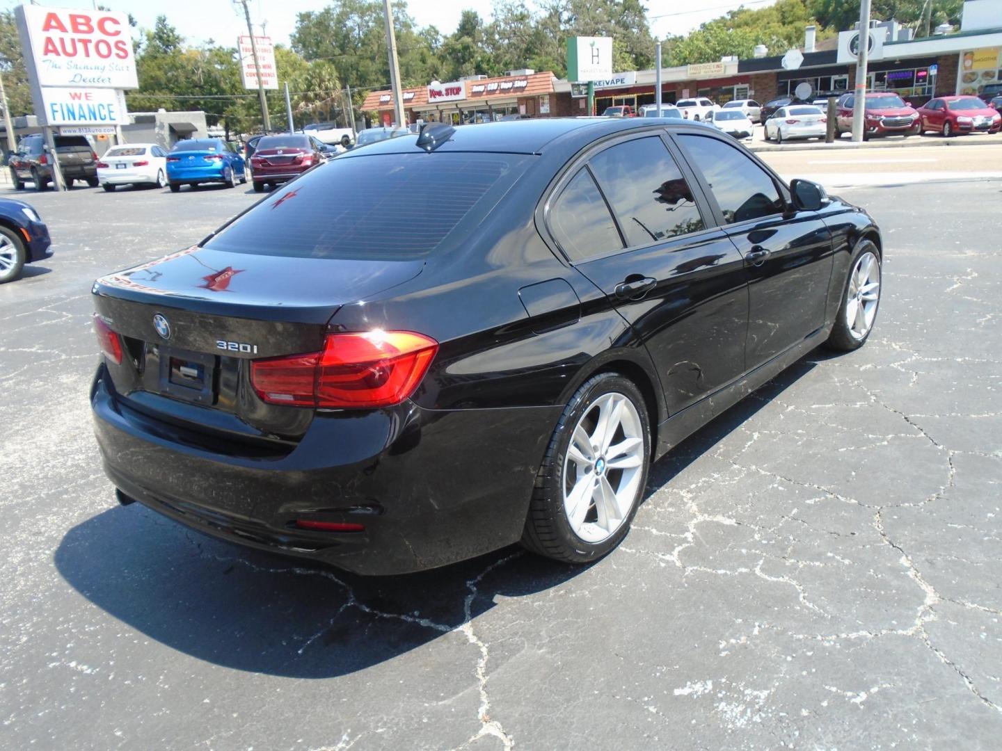 2016 BLACK /Black BMW 3-Series 320i Sedan (WBA8E1G54GN) with an 2.0L L4 DOHC 16V engine, 8A transmission, located at 6112 N Florida Avenue, Tampa, FL, 33604, (888) 521-5131, 27.954929, -82.459534 - 499$ down plus tax & tag. - Photo#4