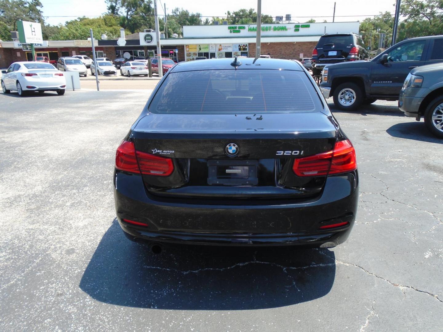 2016 BLACK /Black BMW 3-Series 320i Sedan (WBA8E1G54GN) with an 2.0L L4 DOHC 16V engine, 8A transmission, located at 6112 N Florida Avenue, Tampa, FL, 33604, (888) 521-5131, 27.954929, -82.459534 - 499$ down plus tax & tag. - Photo#5