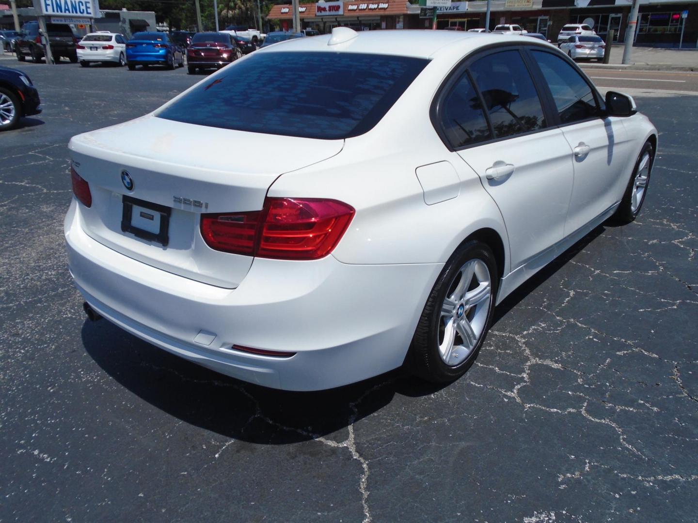 2014 White /Beige BMW 3-Series 328i Sedan (WBA3A5C57EF) with an 2.0L L4 DOHC 16V engine, located at 6112 N Florida Avenue, Tampa, FL, 33604, (888) 521-5131, 27.954929, -82.459534 - 499$ down plus tax & tag. - Photo#5