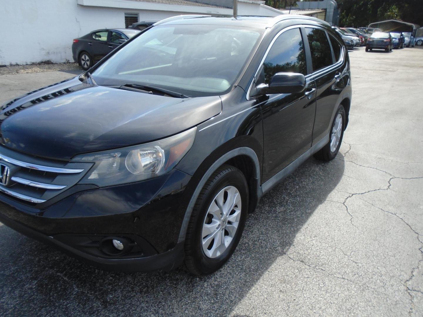 2014 BLACK /Grey Honda CR-V EX-L 2WD 5-Speed AT (2HKRM3H70EH) with an 2.4L L4 DOHC 16V engine, 5-Speed Automatic transmission, located at 6112 N Florida Avenue, Tampa, FL, 33604, (888) 521-5131, 27.954929, -82.459534 - 499$ down plus tax & tag. - Photo#2