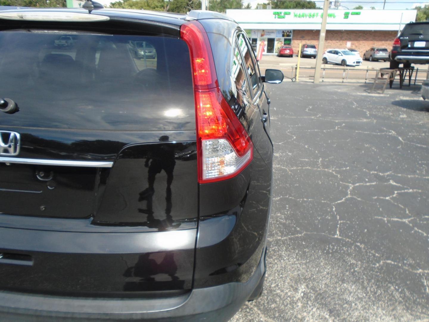 2014 BLACK /Grey Honda CR-V EX-L 2WD 5-Speed AT (2HKRM3H70EH) with an 2.4L L4 DOHC 16V engine, 5-Speed Automatic transmission, located at 6112 N Florida Avenue, Tampa, FL, 33604, (888) 521-5131, 27.954929, -82.459534 - 499$ down plus tax & tag. - Photo#4