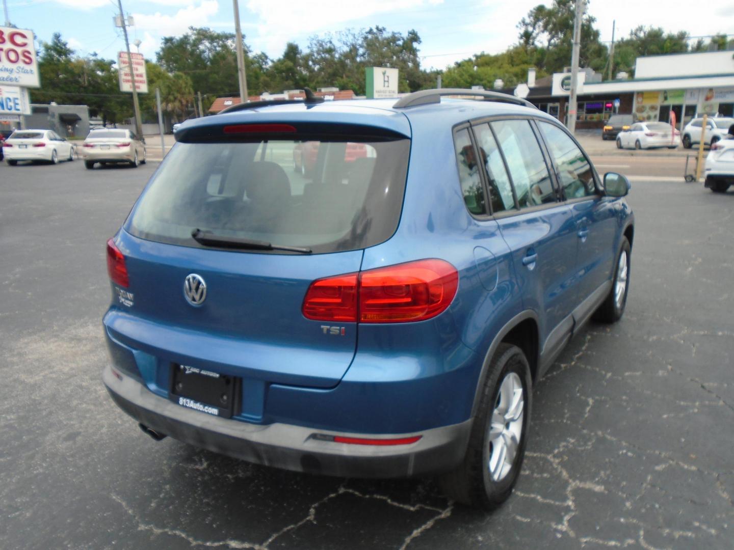 2017 Blue /Black Volkswagen Tiguan SE (WVGAV7AX3HK) with an 2.0L L4 DOHC 16V TURBO engine, 6A transmission, located at 6112 N Florida Avenue, Tampa, FL, 33604, (888) 521-5131, 27.954929, -82.459534 - 499$ down plus tax & tag. - Photo#5