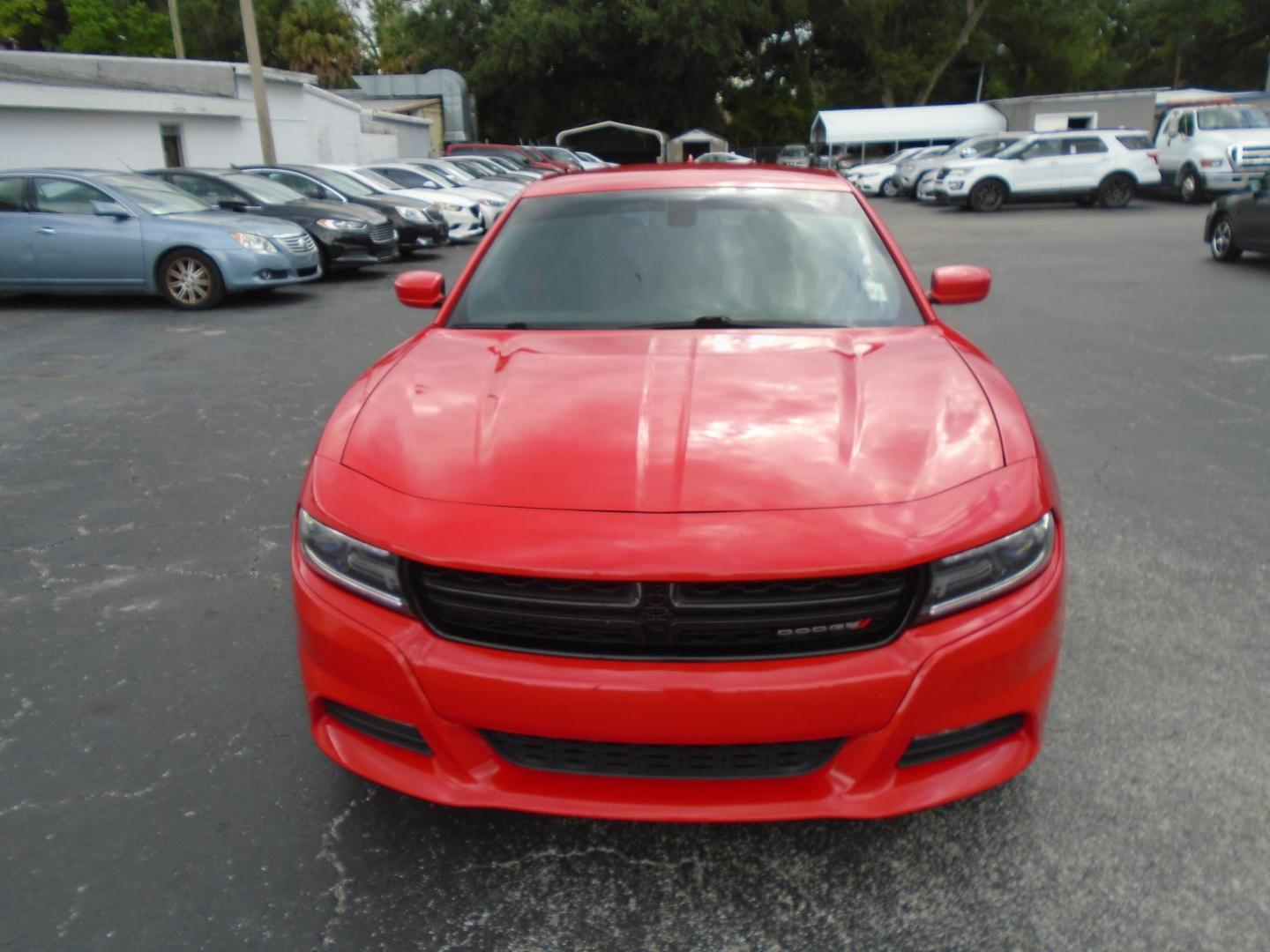 2015 RED /BLACK Dodge Charger SXT (2C3CDXHG9FH) with an 3.6L V6 DOHC 24V engine, 8-Speed Automatic transmission, located at 6112 N Florida Avenue, Tampa, FL, 33604, (888) 521-5131, 27.954929, -82.459534 - Just 499$ down plus tax & tag. - Photo#1