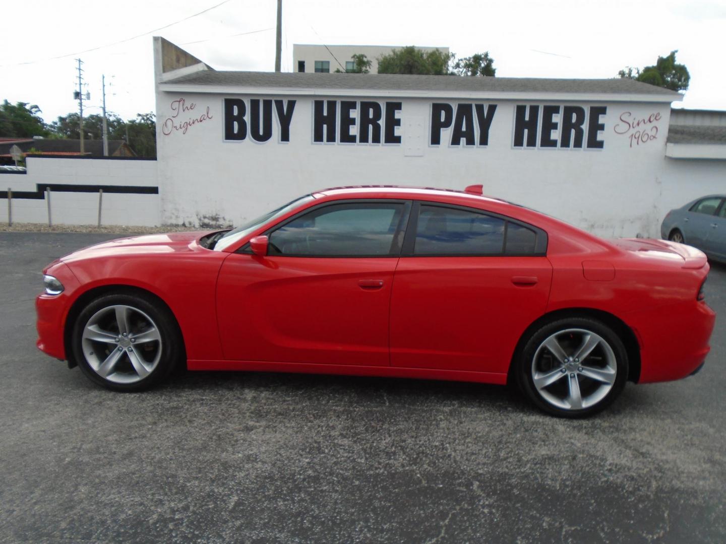 2015 RED /BLACK Dodge Charger SXT (2C3CDXHG9FH) with an 3.6L V6 DOHC 24V engine, 8-Speed Automatic transmission, located at 6112 N Florida Avenue, Tampa, FL, 33604, (888) 521-5131, 27.954929, -82.459534 - Just 499$ down plus tax & tag. - Photo#0