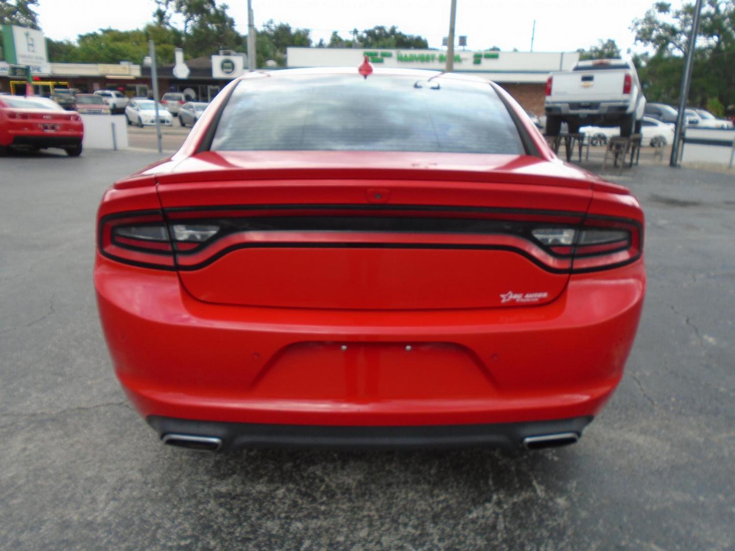 2015 RED /BLACK Dodge Charger SXT (2C3CDXHG9FH) with an 3.6L V6 DOHC 24V engine, 8-Speed Automatic transmission, located at 6112 N Florida Avenue, Tampa, FL, 33604, (888) 521-5131, 27.954929, -82.459534 - Just 499$ down plus tax & tag. - Photo#3