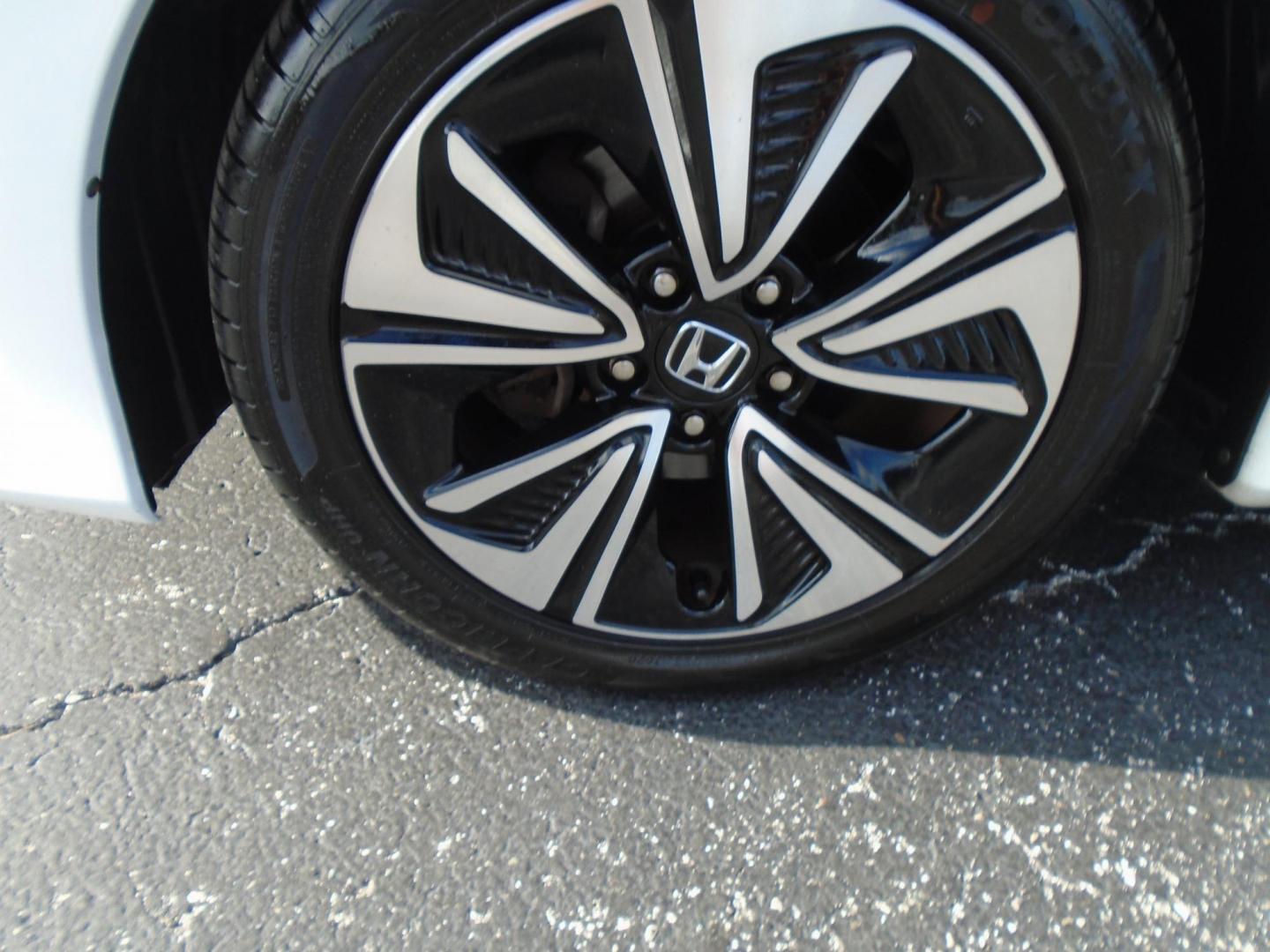 2016 White /Grey Honda Civic EX-T Sedan CVT (2HGFC1F31GH) with an 1.5L L4 DOHC 16V TURBO engine, CVT transmission, located at 6112 N Florida Avenue, Tampa, FL, 33604, (888) 521-5131, 27.954929, -82.459534 - Just $499 down, plus tax & tag. - Photo#12