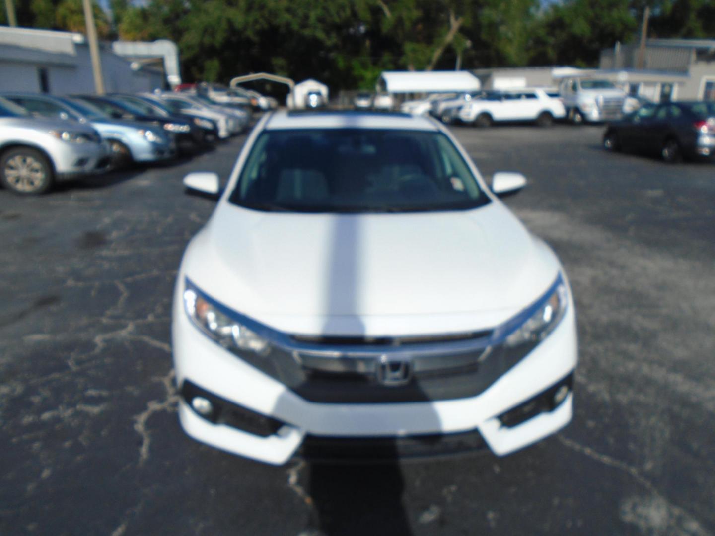 2016 White /Grey Honda Civic EX-T Sedan CVT (2HGFC1F31GH) with an 1.5L L4 DOHC 16V TURBO engine, CVT transmission, located at 6112 N Florida Avenue, Tampa, FL, 33604, (888) 521-5131, 27.954929, -82.459534 - Just $499 down, plus tax & tag. - Photo#1