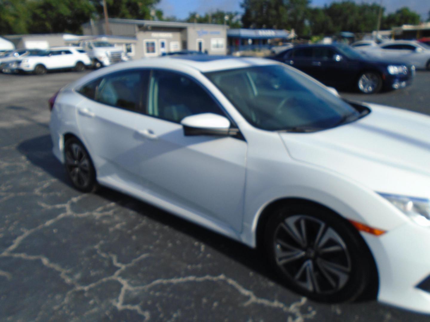 2016 White /Grey Honda Civic EX-T Sedan CVT (2HGFC1F31GH) with an 1.5L L4 DOHC 16V TURBO engine, CVT transmission, located at 6112 N Florida Avenue, Tampa, FL, 33604, (888) 521-5131, 27.954929, -82.459534 - Just $499 down, plus tax & tag. - Photo#2
