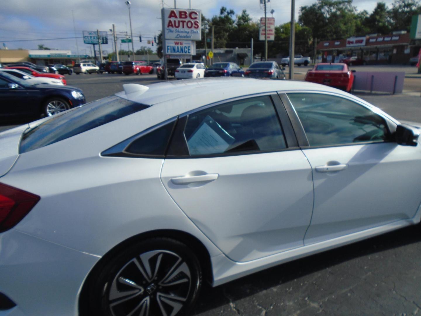 2016 White /Grey Honda Civic EX-T Sedan CVT (2HGFC1F31GH) with an 1.5L L4 DOHC 16V TURBO engine, CVT transmission, located at 6112 N Florida Avenue, Tampa, FL, 33604, (888) 521-5131, 27.954929, -82.459534 - Just $499 down, plus tax & tag. - Photo#3