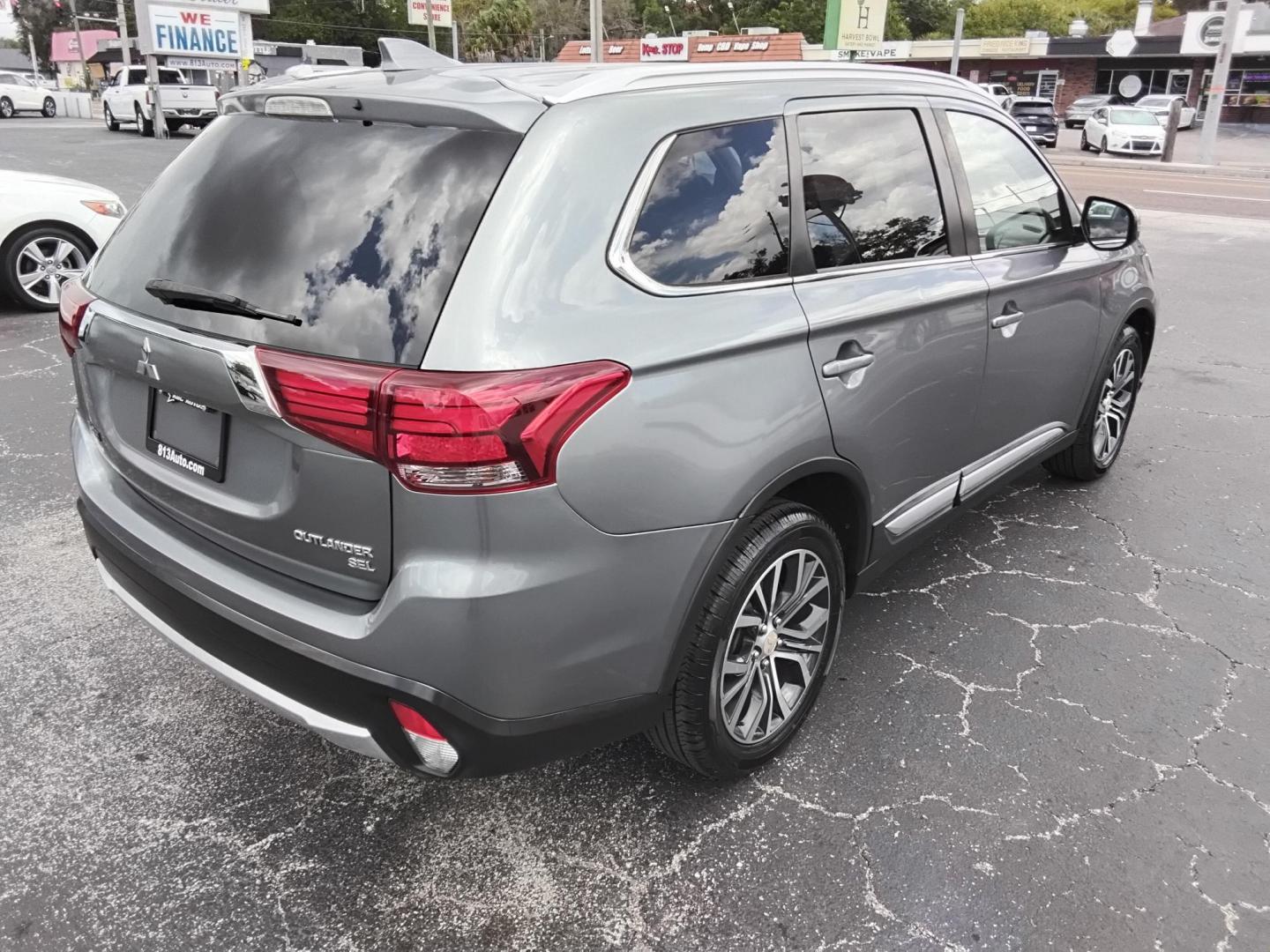 2018 GRAY /Black Mitsubishi Outlander SE 2WD (JA4AD3A32JJ) with an 2.4L L4 DOHC 16V engine, CVT transmission, located at 6112 N Florida Avenue, Tampa, FL, 33604, (888) 521-5131, 27.954929, -82.459534 - 499$ DOWN PLUS TAX & TAG. - Photo#6