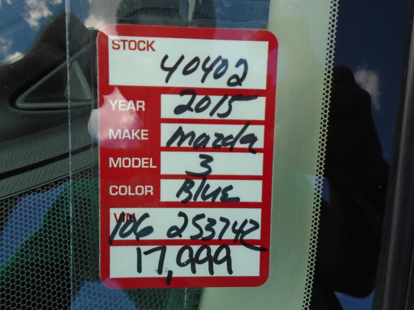 2015 Blue /106470 Mazda MAZDA3 i Grand Touring MT 4-Door (JM1BM1W7XF1) with an 2.0L L4 DOHC 16V engine, 6-Speed Manual transmission, located at 6112 N Florida Avenue, Tampa, FL, 33604, (888) 521-5131, 27.954929, -82.459534 - $499 down plus tax & tag. - Photo#0