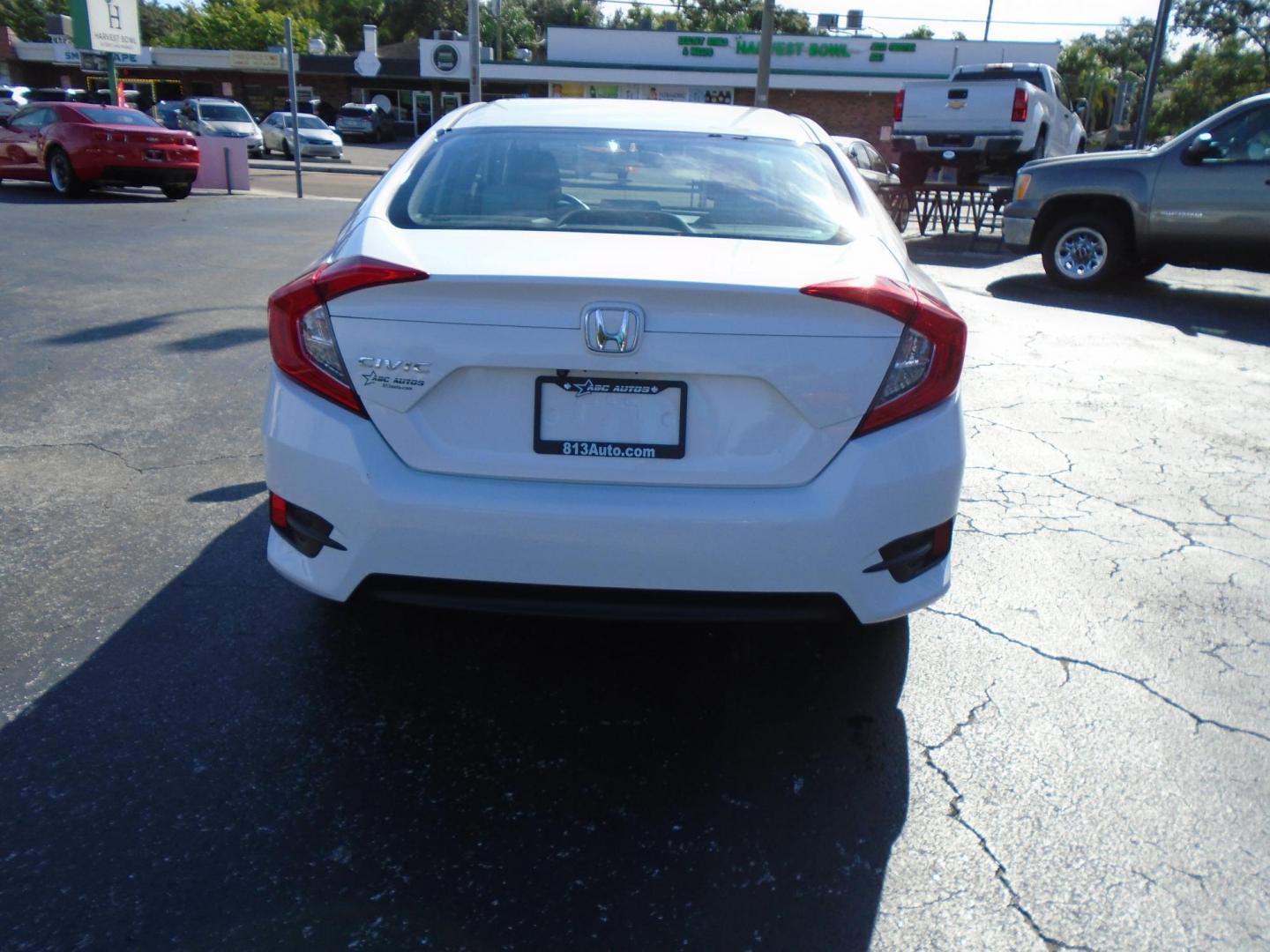 2016 White /Beige Honda Civic LX Sedan CVT (2HGFC2F51GH) with an 2.0L L4 DOHC 16V engine, CVT transmission, located at 6112 N Florida Avenue, Tampa, FL, 33604, (888) 521-5131, 27.954929, -82.459534 - 499$ down plus tax & tag. - Photo#4