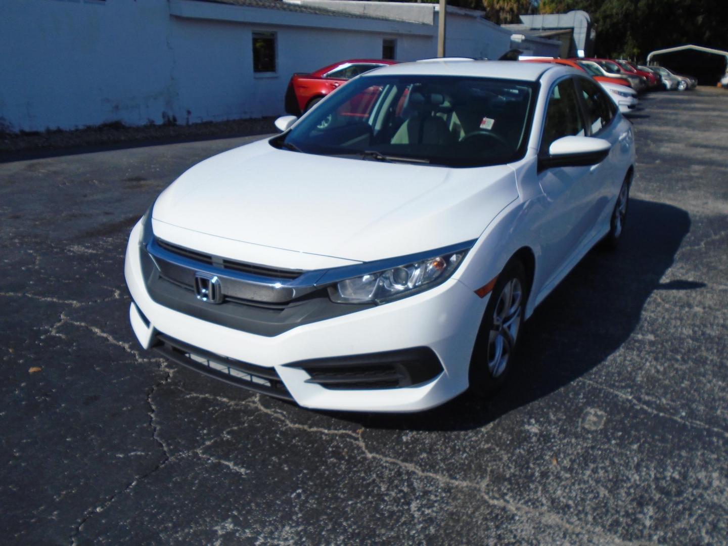 2016 White /Beige Honda Civic LX Sedan CVT (2HGFC2F51GH) with an 2.0L L4 DOHC 16V engine, CVT transmission, located at 6112 N Florida Avenue, Tampa, FL, 33604, (888) 521-5131, 27.954929, -82.459534 - 499$ down plus tax & tag. - Photo#2