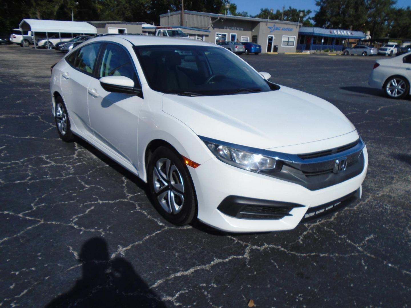 2016 White /Beige Honda Civic LX Sedan CVT (2HGFC2F51GH) with an 2.0L L4 DOHC 16V engine, CVT transmission, located at 6112 N Florida Avenue, Tampa, FL, 33604, (888) 521-5131, 27.954929, -82.459534 - 499$ down plus tax & tag. - Photo#3