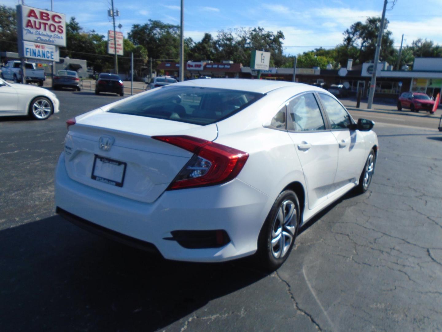 2016 White /Beige Honda Civic LX Sedan CVT (2HGFC2F51GH) with an 2.0L L4 DOHC 16V engine, CVT transmission, located at 6112 N Florida Avenue, Tampa, FL, 33604, (888) 521-5131, 27.954929, -82.459534 - 499$ down plus tax & tag. - Photo#5