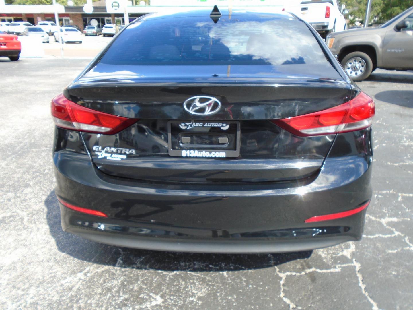 2018 BLACK /Beige Hyundai Elantra Limited (5NPD84LF5JH) with an 1.8L L4 DOHC 16V engine, 6A transmission, located at 6112 N Florida Avenue, Tampa, FL, 33604, (888) 521-5131, 27.954929, -82.459534 - 499$ down plus tax & tag. - Photo#3