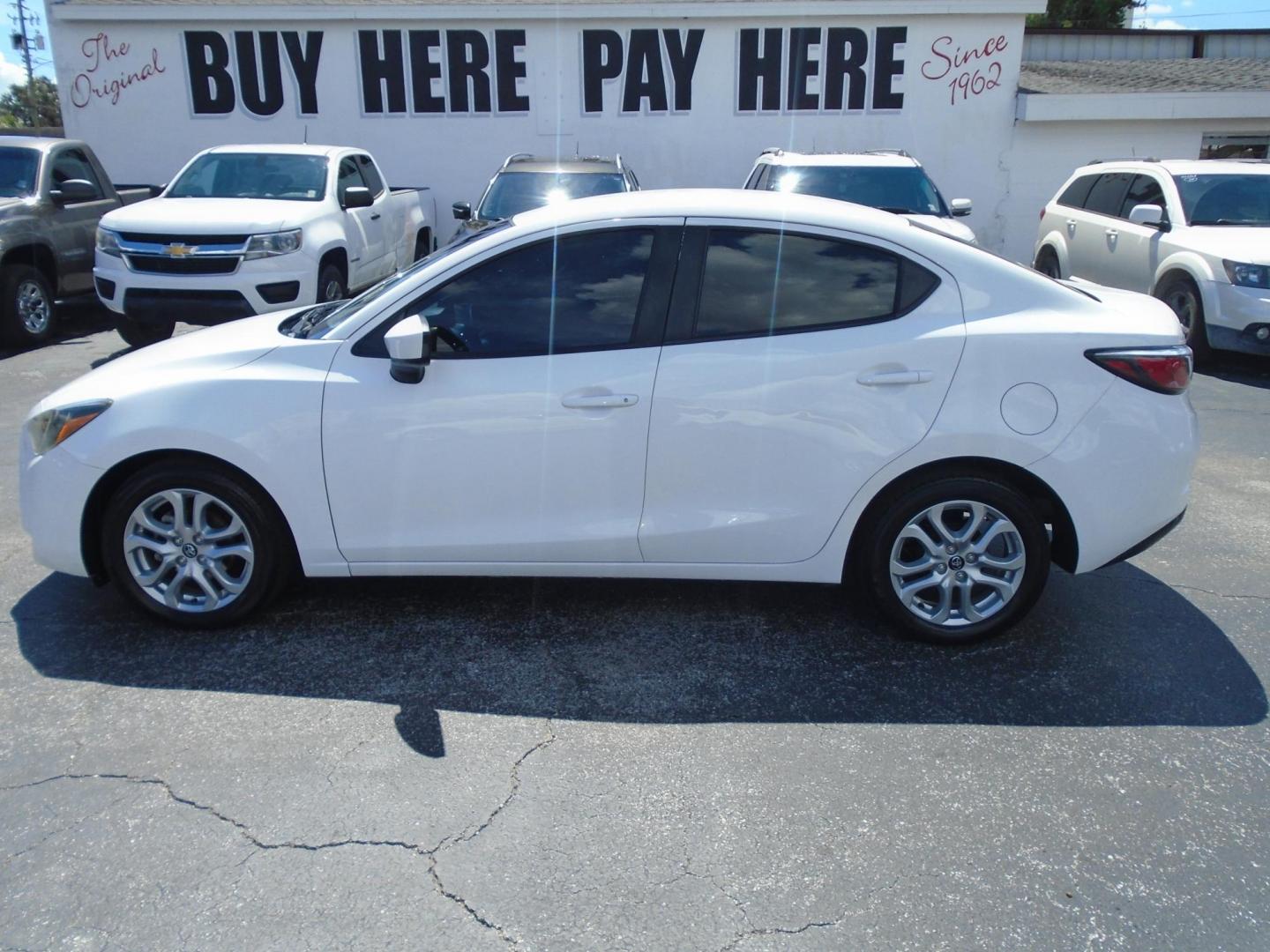 2017 White /Grey & blue Scion Yaris iA 6M (3MYDLBYV1HY) with an 1.5L L4 DOHC 16V engine, 6M transmission, located at 6112 N Florida Avenue, Tampa, FL, 33604, (888) 521-5131, 27.954929, -82.459534 - 499$ down plus tax & tag. - Photo#0