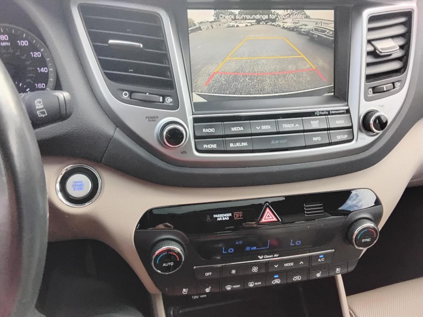 2016 White /Beige Hyundai Tucson Eco (KM8J33A25GU) with an 1.6L L4 DOHC 16V engine, 7A transmission, located at 6112 N Florida Avenue, Tampa, FL, 33604, (888) 521-5131, 27.954929, -82.459534 - 499$ down plus tax & tag. - Photo#13