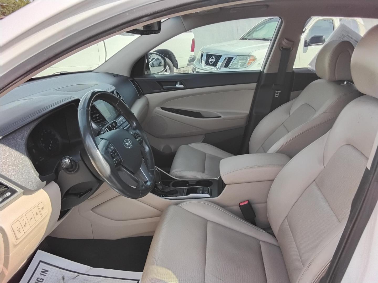 2016 White /Beige Hyundai Tucson Eco (KM8J33A25GU) with an 1.6L L4 DOHC 16V engine, 7A transmission, located at 6112 N Florida Avenue, Tampa, FL, 33604, (888) 521-5131, 27.954929, -82.459534 - 499$ down plus tax & tag. - Photo#5
