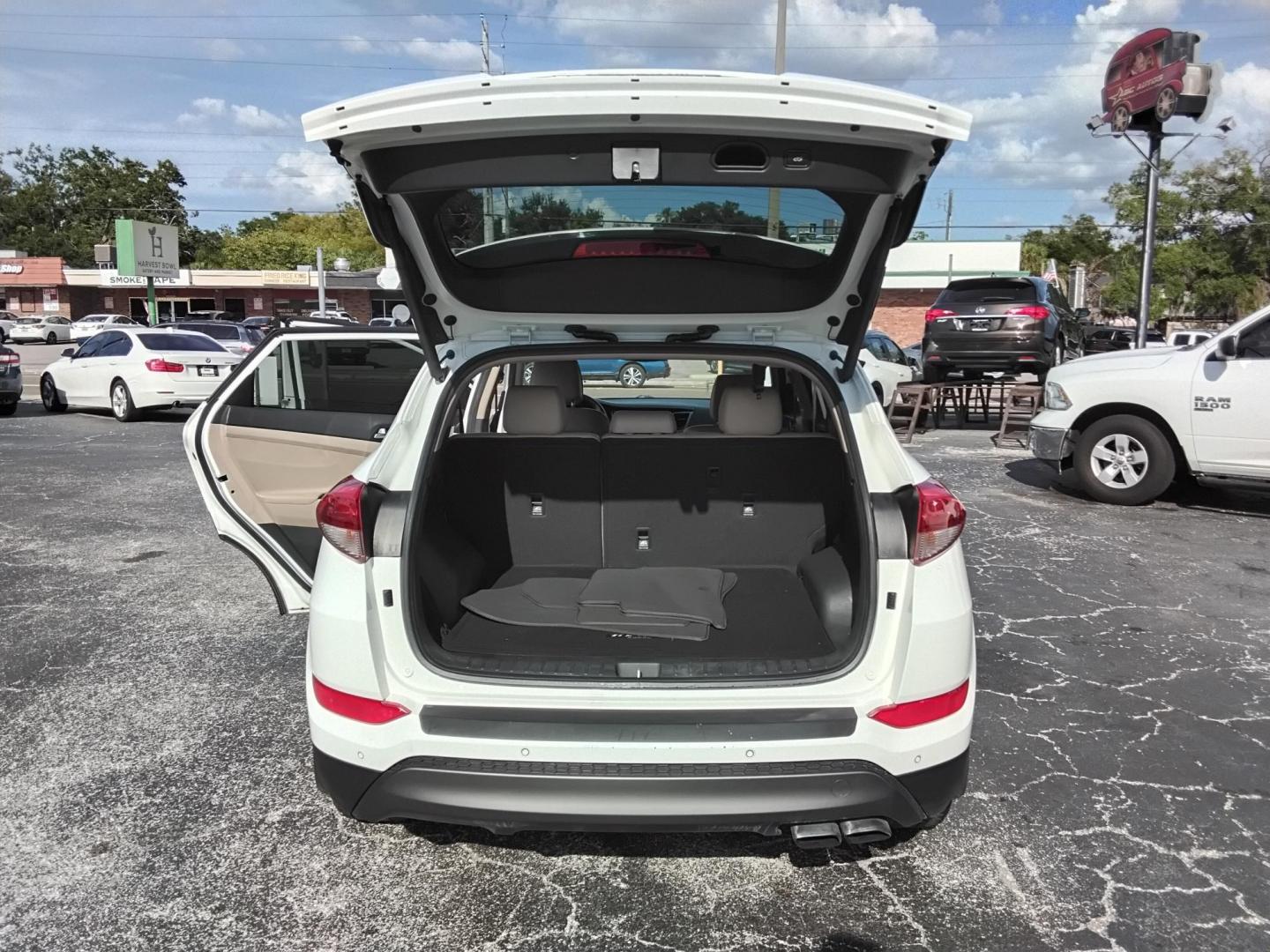 2016 White /Beige Hyundai Tucson Eco (KM8J33A25GU) with an 1.6L L4 DOHC 16V engine, 7A transmission, located at 6112 N Florida Avenue, Tampa, FL, 33604, (888) 521-5131, 27.954929, -82.459534 - 499$ down plus tax & tag. - Photo#4