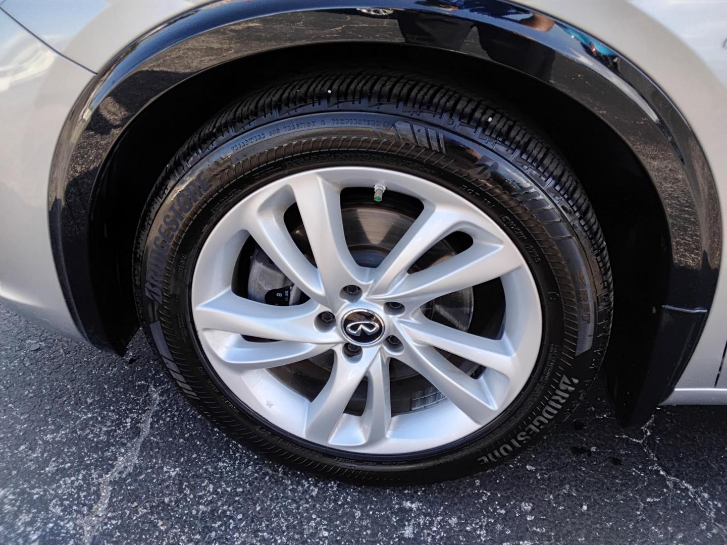 2018 SILVER /Black Infiniti QX30 Luxury (SJKCH5CPXJA) with an 2.0L L4 DOHC 16V engine, 7A transmission, located at 6112 N Florida Avenue, Tampa, FL, 33604, (888) 521-5131, 27.954929, -82.459534 - 499$ down plus tax & tag - Photo#14