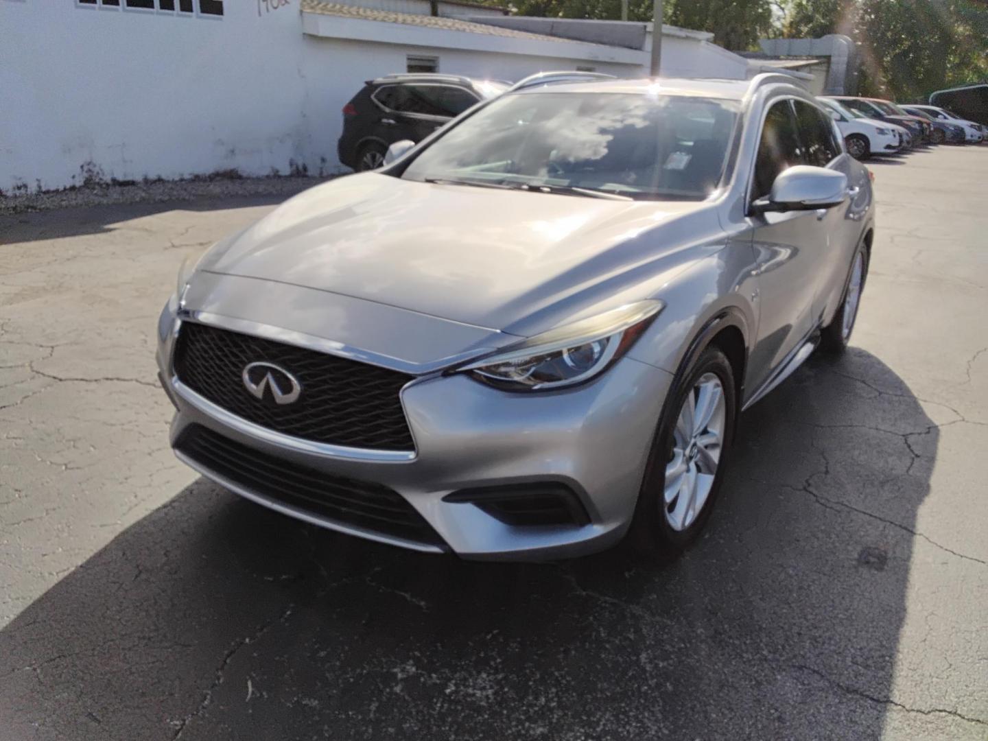 2018 SILVER /Black Infiniti QX30 Luxury (SJKCH5CPXJA) with an 2.0L L4 DOHC 16V engine, 7A transmission, located at 6112 N Florida Avenue, Tampa, FL, 33604, (888) 521-5131, 27.954929, -82.459534 - 499$ down plus tax & tag - Photo#1