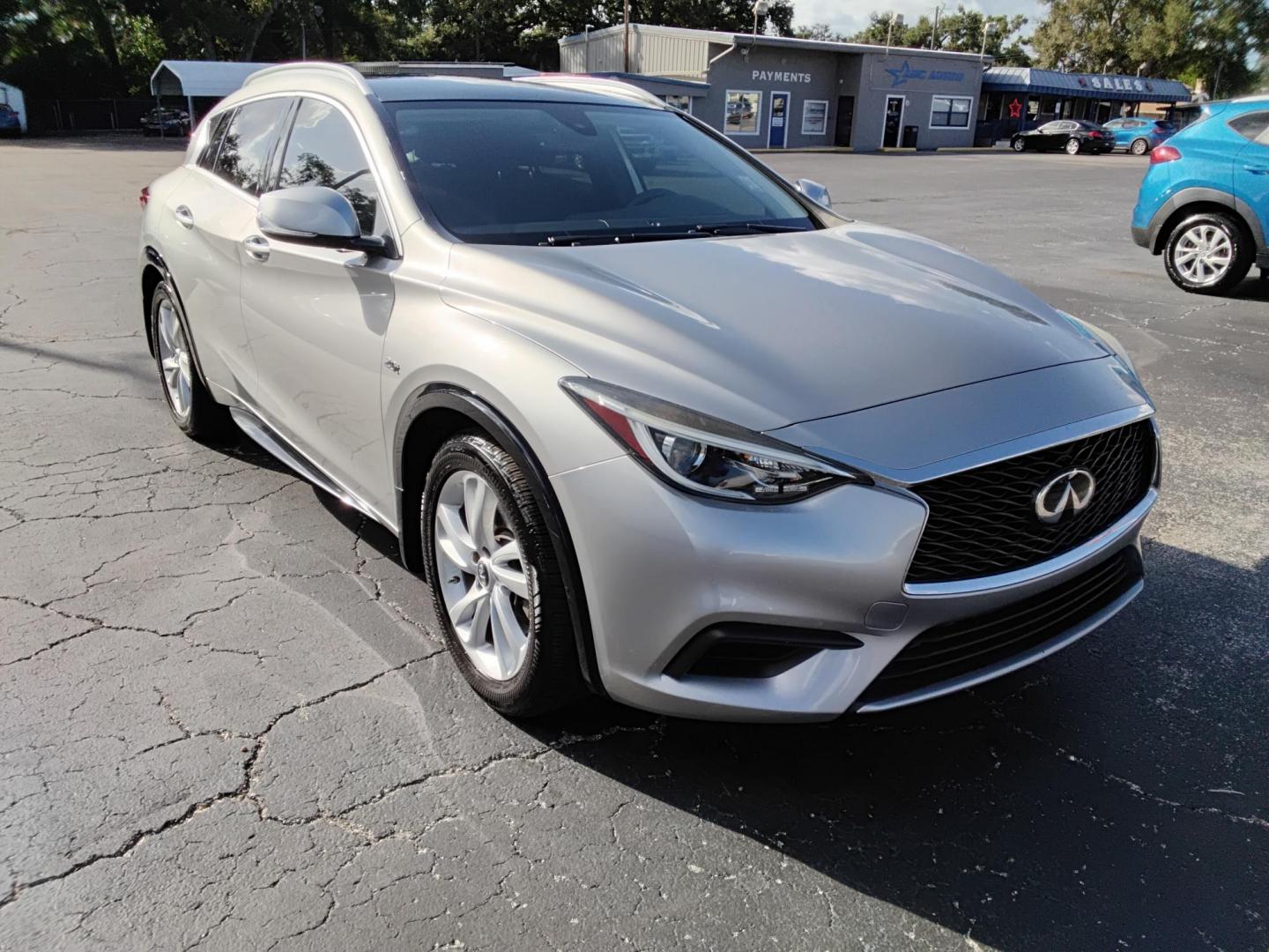 2018 SILVER /Black Infiniti QX30 Luxury (SJKCH5CPXJA) with an 2.0L L4 DOHC 16V engine, 7A transmission, located at 6112 N Florida Avenue, Tampa, FL, 33604, (888) 521-5131, 27.954929, -82.459534 - 499$ down plus tax & tag - Photo#2