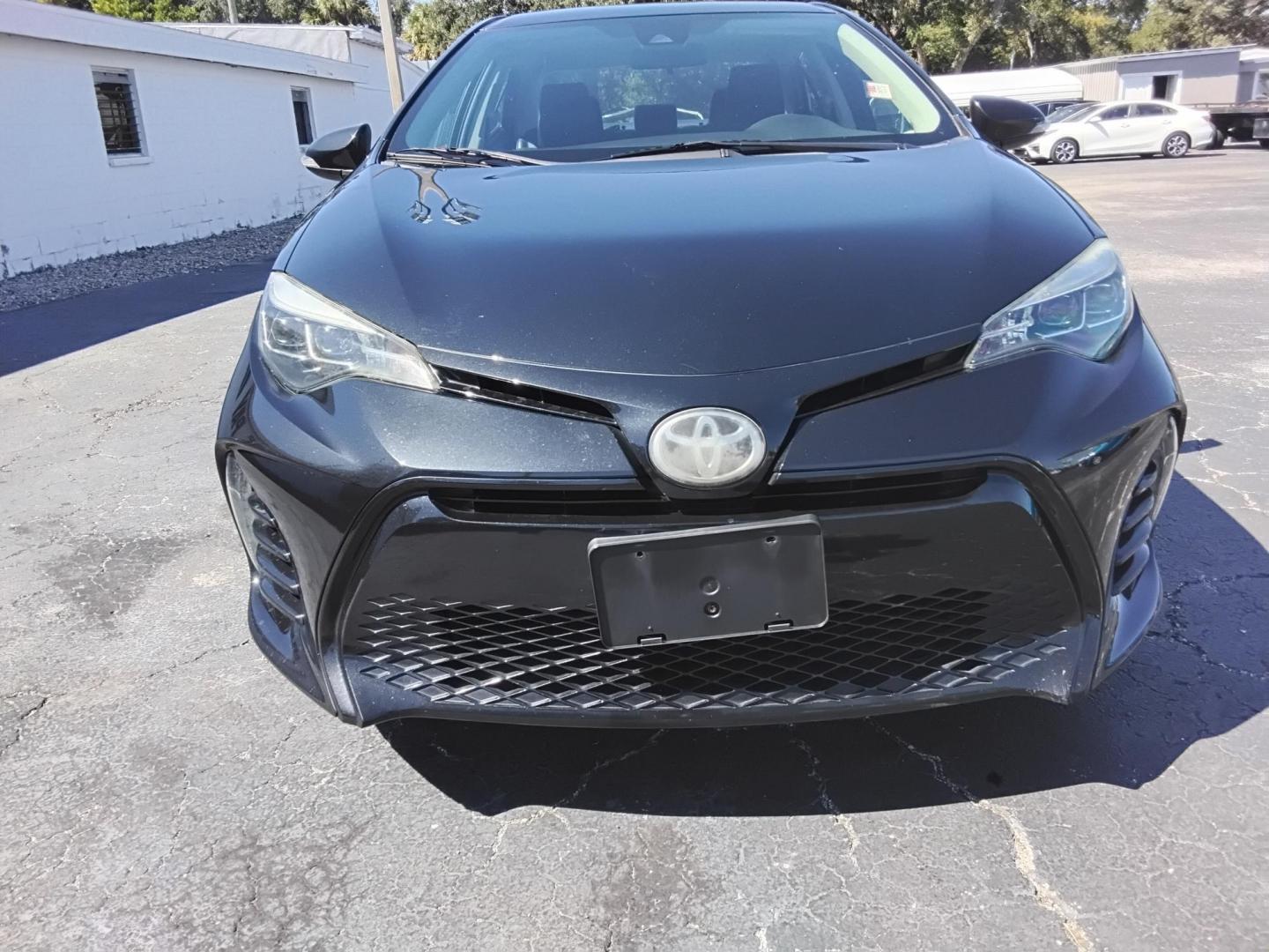2017 BLACK /Grey Toyota Corolla L CVT (2T1BURHE6HC) with an 1.8L L4 DOHC 16V engine, CVT transmission, located at 6112 N Florida Avenue, Tampa, FL, 33604, (888) 521-5131, 27.954929, -82.459534 - 499$ DOWN PLUS TAX & TAG. - Photo#3