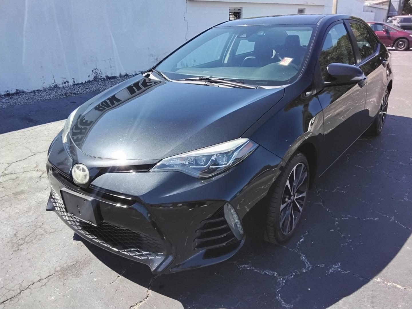 2017 BLACK /Grey Toyota Corolla L CVT (2T1BURHE6HC) with an 1.8L L4 DOHC 16V engine, CVT transmission, located at 6112 N Florida Avenue, Tampa, FL, 33604, (888) 521-5131, 27.954929, -82.459534 - 499$ DOWN PLUS TAX & TAG. - Photo#2