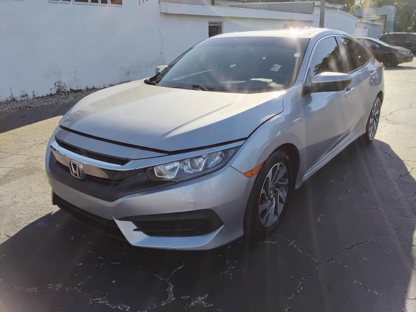 2018 GRAY /Grey Honda Civic EX Sedan CVT (19XFC2F71JE) with an 2.0L L4 DOHC 16V engine, CVT transmission, located at 6112 N Florida Avenue, Tampa, FL, 33604, (888) 521-5131, 27.954929, -82.459534 - 499$ down plus tax & tag. - Photo#2