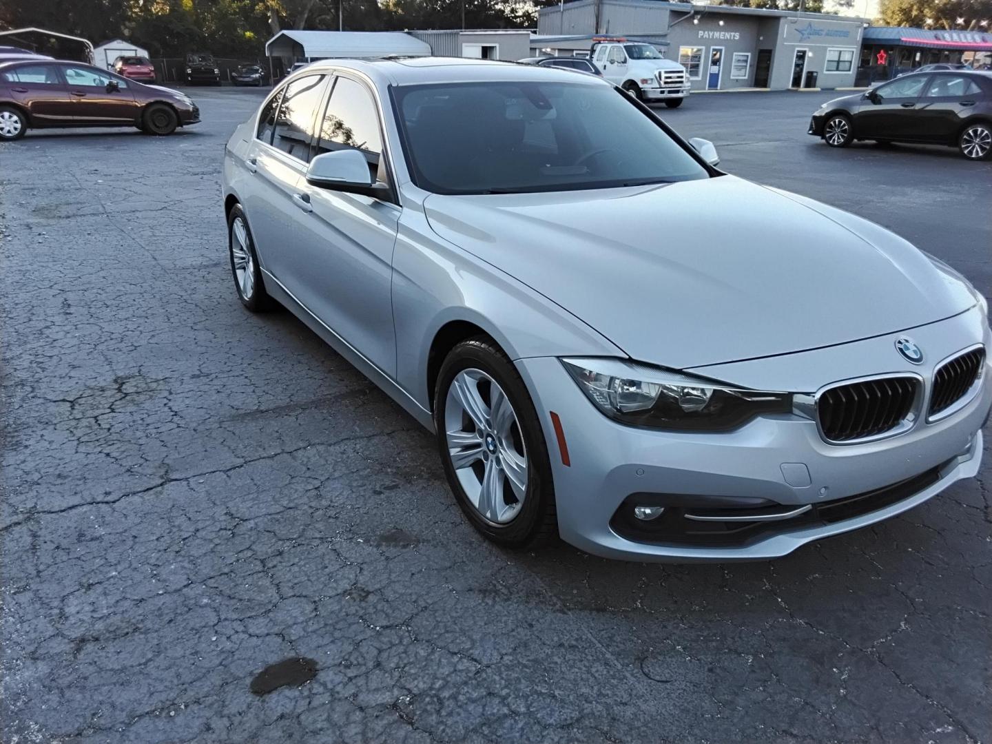 2017 SILVER /Black BMW 3-Series 330i SULEV Sedan (WBA8B9G53HN) with an 3.0L L6 DOHC 24V engine, 8A transmission, located at 6112 N Florida Avenue, Tampa, FL, 33604, (888) 521-5131, 27.954929, -82.459534 - 499$ down plus tax & tag. - Photo#2