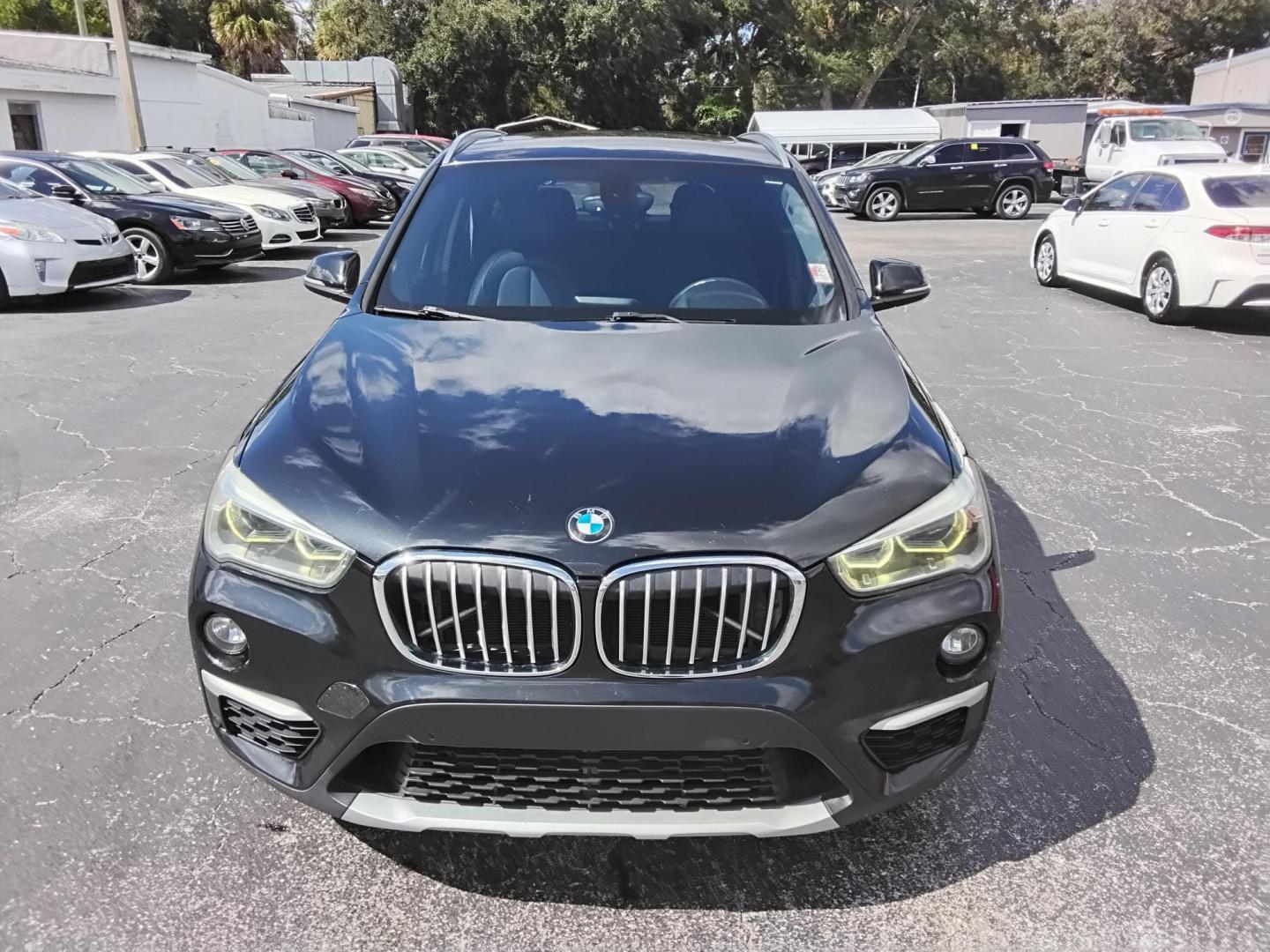 2017 BLACK /Black BMW X1 xDrive28i (WBXHT3C37H5) with an 2.0L L4 DOHC 16V engine, 8A transmission, located at 6112 N Florida Avenue, Tampa, FL, 33604, (888) 521-5131, 27.954929, -82.459534 - 499$ down plus tax & tag. - Photo#2