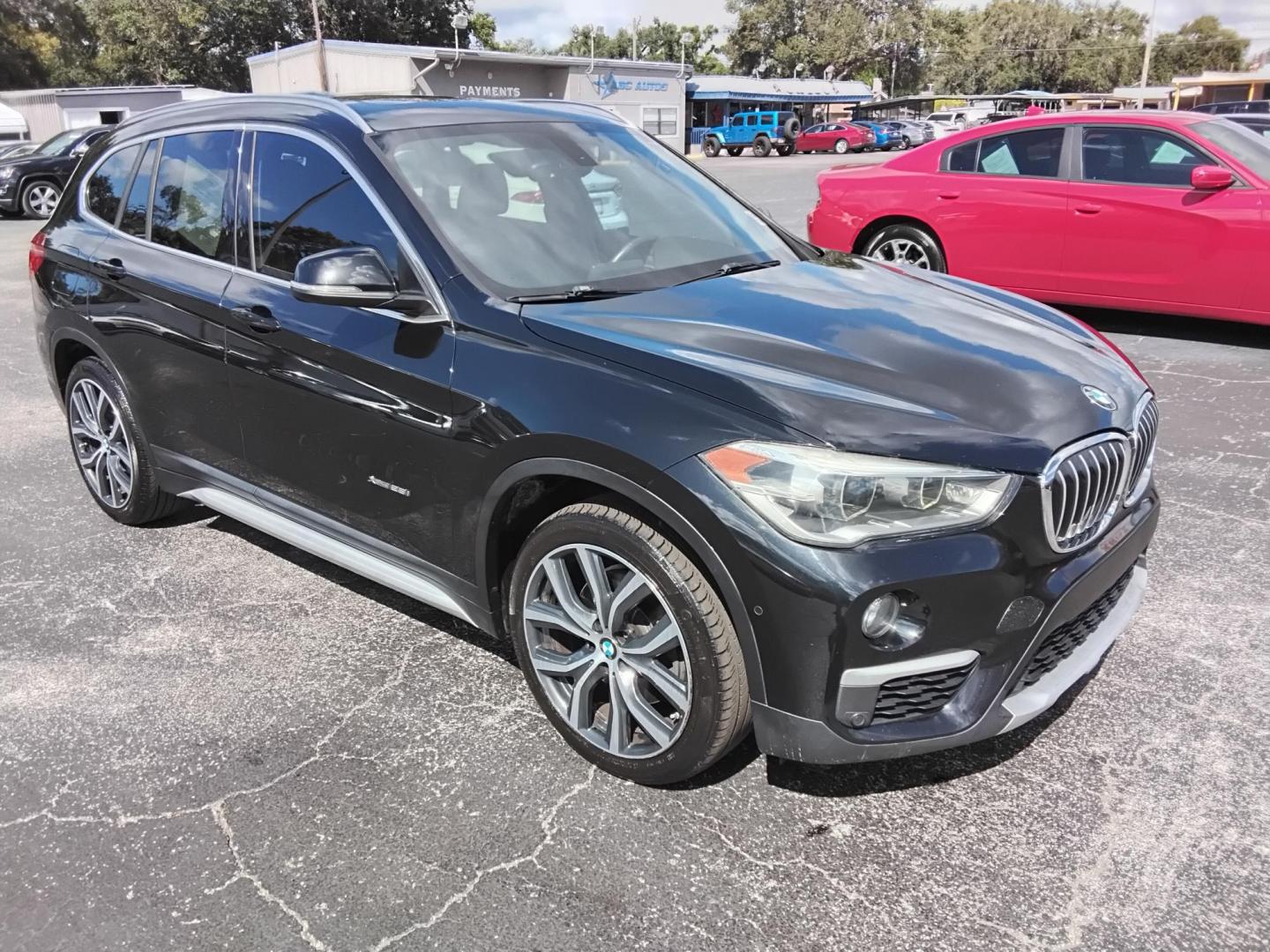 2017 BLACK /Black BMW X1 xDrive28i (WBXHT3C37H5) with an 2.0L L4 DOHC 16V engine, 8A transmission, located at 6112 N Florida Avenue, Tampa, FL, 33604, (888) 521-5131, 27.954929, -82.459534 - 499$ down plus tax & tag. - Photo#5