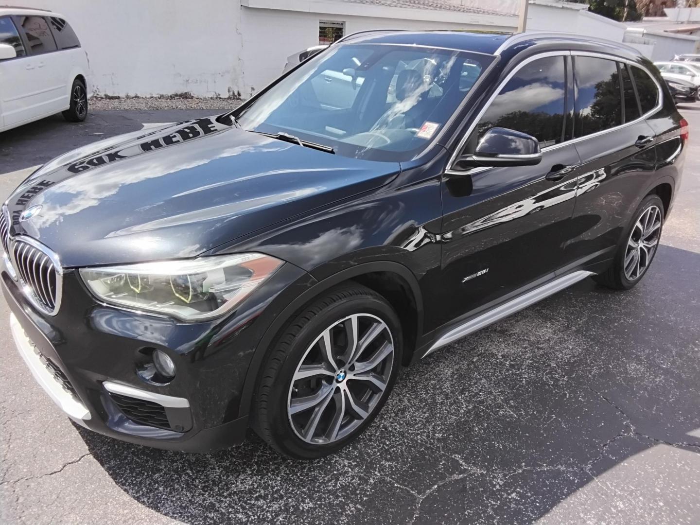 2017 BLACK /Black BMW X1 xDrive28i (WBXHT3C37H5) with an 2.0L L4 DOHC 16V engine, 8A transmission, located at 6112 N Florida Avenue, Tampa, FL, 33604, (888) 521-5131, 27.954929, -82.459534 - 499$ down plus tax & tag. - Photo#3