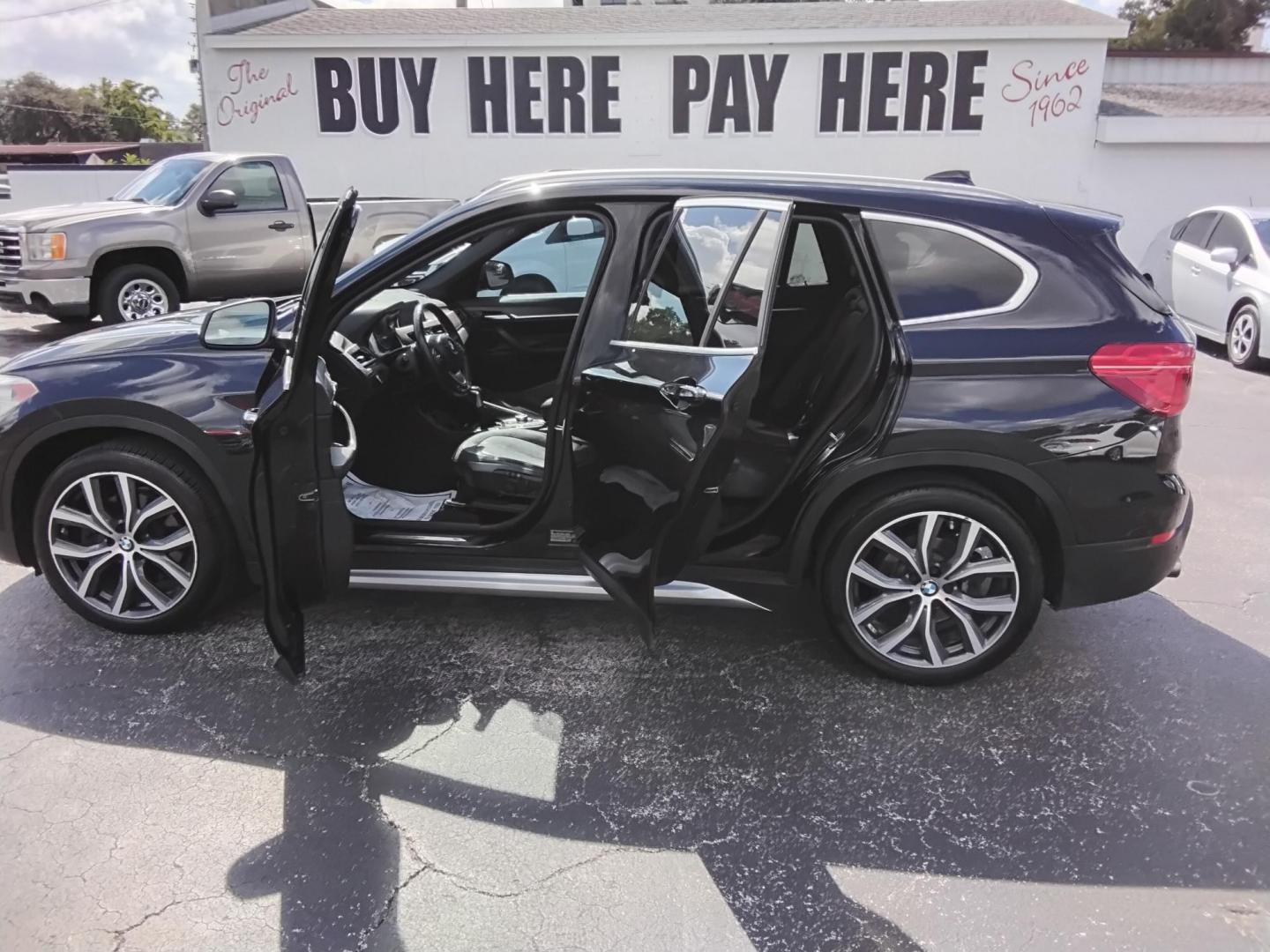 2017 BLACK /Black BMW X1 xDrive28i (WBXHT3C37H5) with an 2.0L L4 DOHC 16V engine, 8A transmission, located at 6112 N Florida Avenue, Tampa, FL, 33604, (888) 521-5131, 27.954929, -82.459534 - 499$ down plus tax & tag. - Photo#1