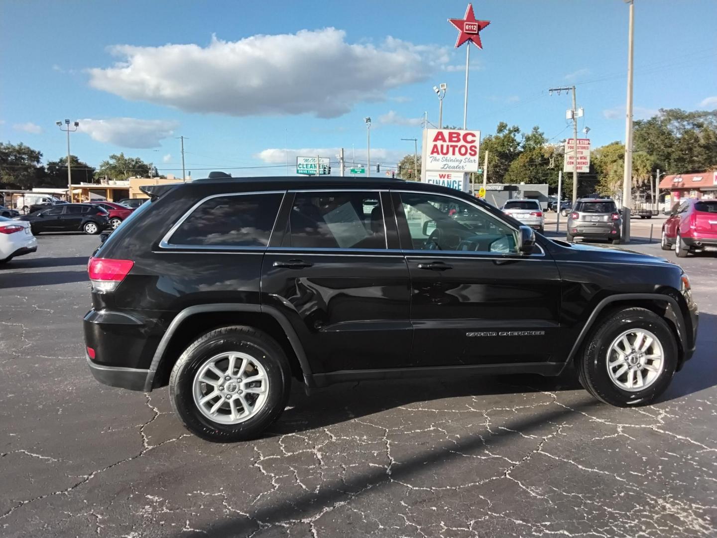 2019 BLACK /Grey Jeep Grand Cherokee Laredo 2WD (1C4RJEAG4KC) with an 3.6L V6 DOHC 24V engine, 8A transmission, located at 6112 N Florida Avenue, Tampa, FL, 33604, (888) 521-5131, 27.954929, -82.459534 - 499$ down plus tax & tag. - Photo#1