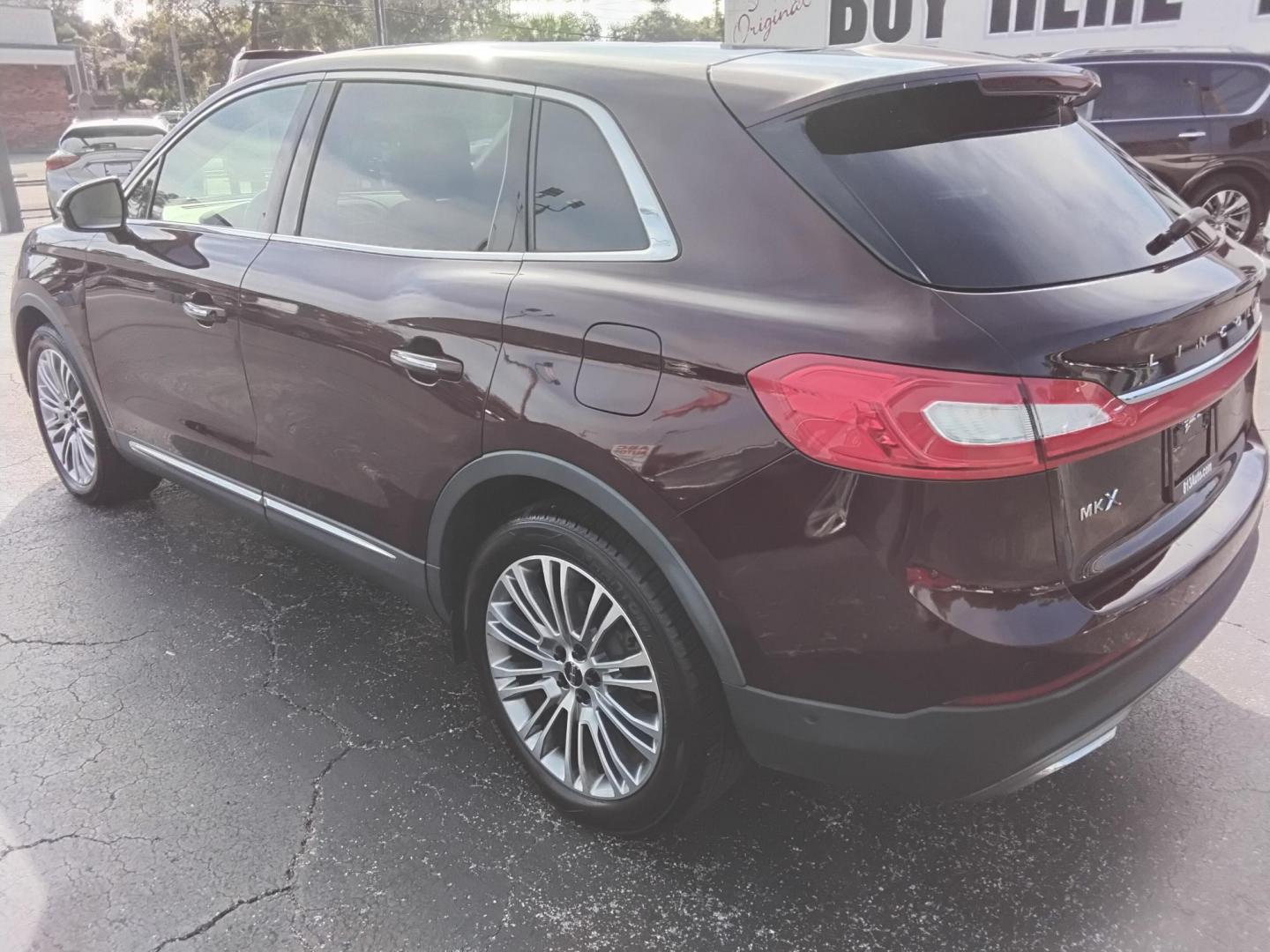 2017 RED LT /Beige Lincoln MKX Reserve (2LMPJ6LR8HB) with an 3.7L V6 DOHC 24V engine, 6A transmission, located at 6112 N Florida Avenue, Tampa, FL, 33604, (888) 521-5131, 27.954929, -82.459534 - 499$ DOWN PLUS TAX & TAG. - Photo#7