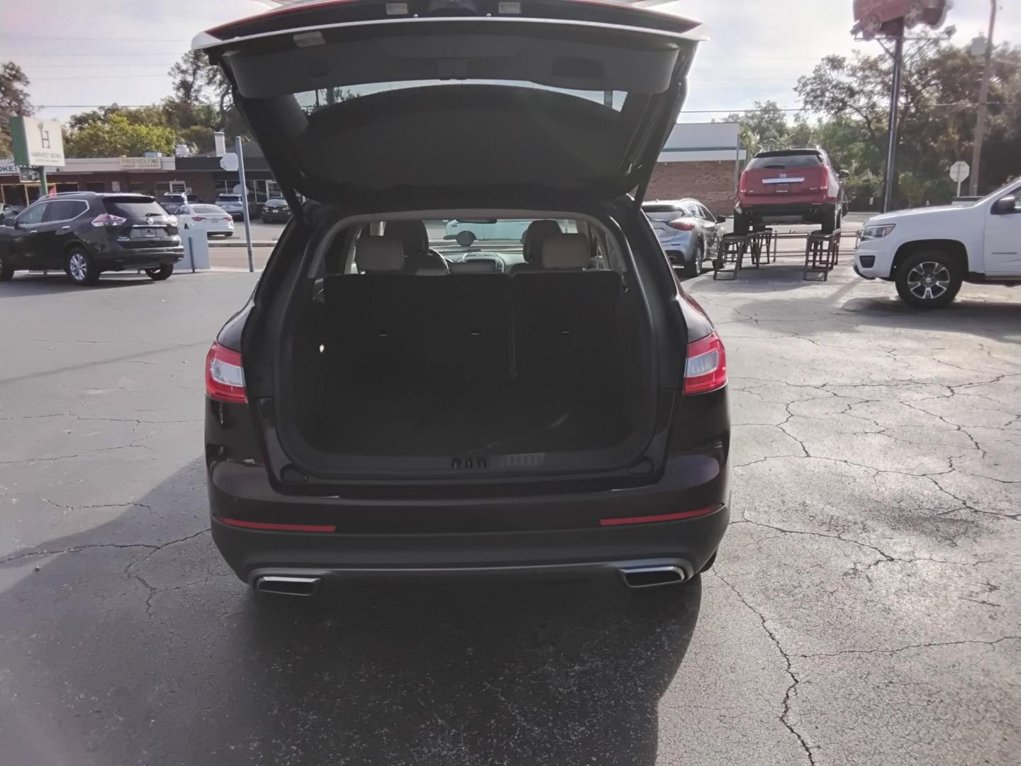 2017 RED LT /Beige Lincoln MKX Reserve (2LMPJ6LR8HB) with an 3.7L V6 DOHC 24V engine, 6A transmission, located at 6112 N Florida Avenue, Tampa, FL, 33604, (888) 521-5131, 27.954929, -82.459534 - 499$ DOWN PLUS TAX & TAG. - Photo#10