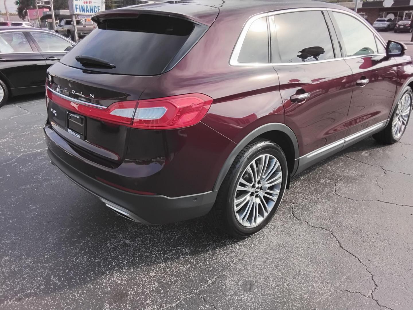2017 RED LT /Beige Lincoln MKX Reserve (2LMPJ6LR8HB) with an 3.7L V6 DOHC 24V engine, 6A transmission, located at 6112 N Florida Avenue, Tampa, FL, 33604, (888) 521-5131, 27.954929, -82.459534 - 499$ DOWN PLUS TAX & TAG. - Photo#6